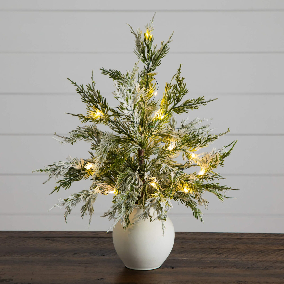 18" Pre-Lit Artificial Mini Snowed Cypress Christmas Tree with 12 LED Lights in White Ceramic Planter