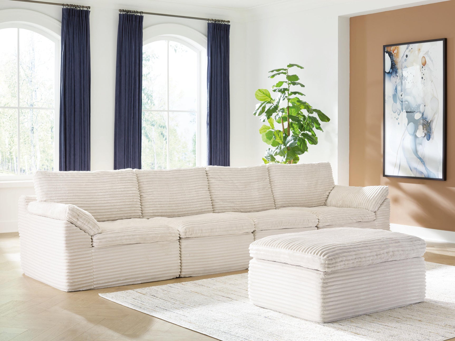 Canefield Ivory 4-Piece Sectional with Ottoman