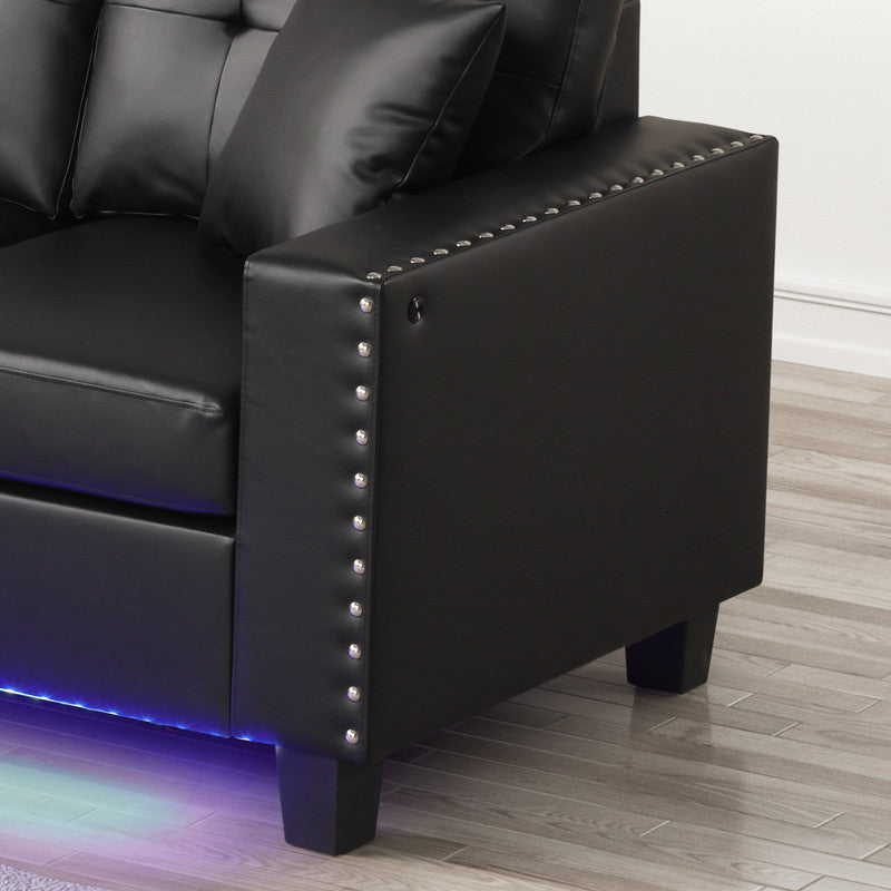 Sorenza Black 74"W PVC Reversible Sectional Sofa with Chaise