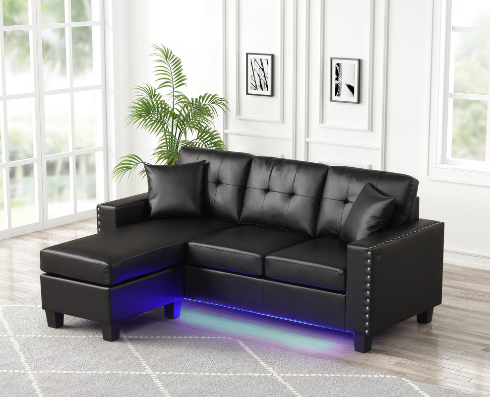 Sorenza Black 74"W PVC Reversible Sectional Sofa with Chaise