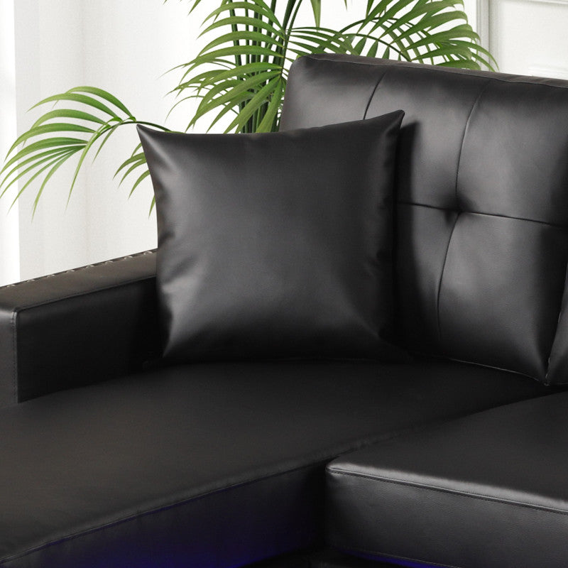 Sorenza Black 74"W PVC Reversible Sectional Sofa with Chaise