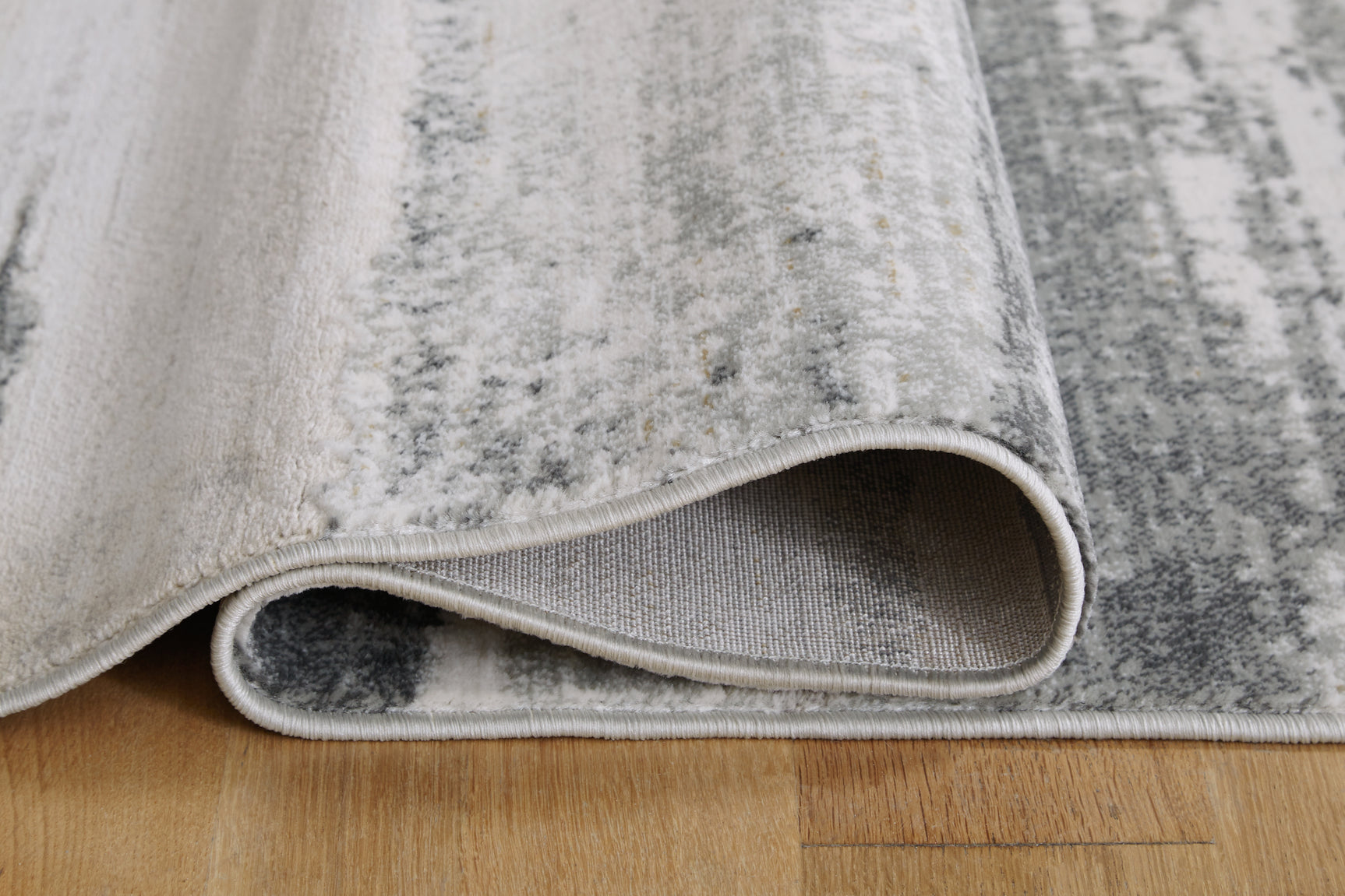 Abanett Cream/Gray Area Rug - Ornate Home