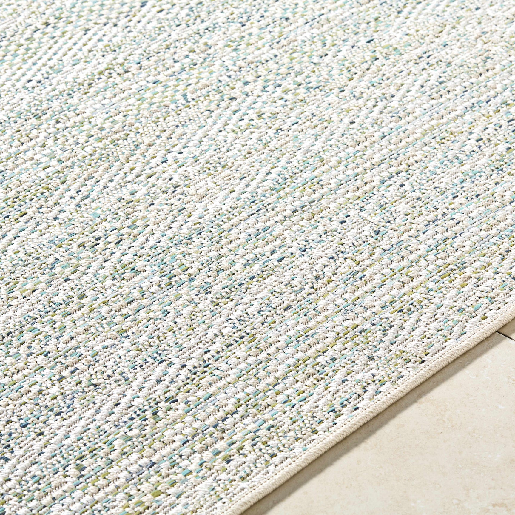 Alezae Ivory Outdoor Area Rug - Ornate Home