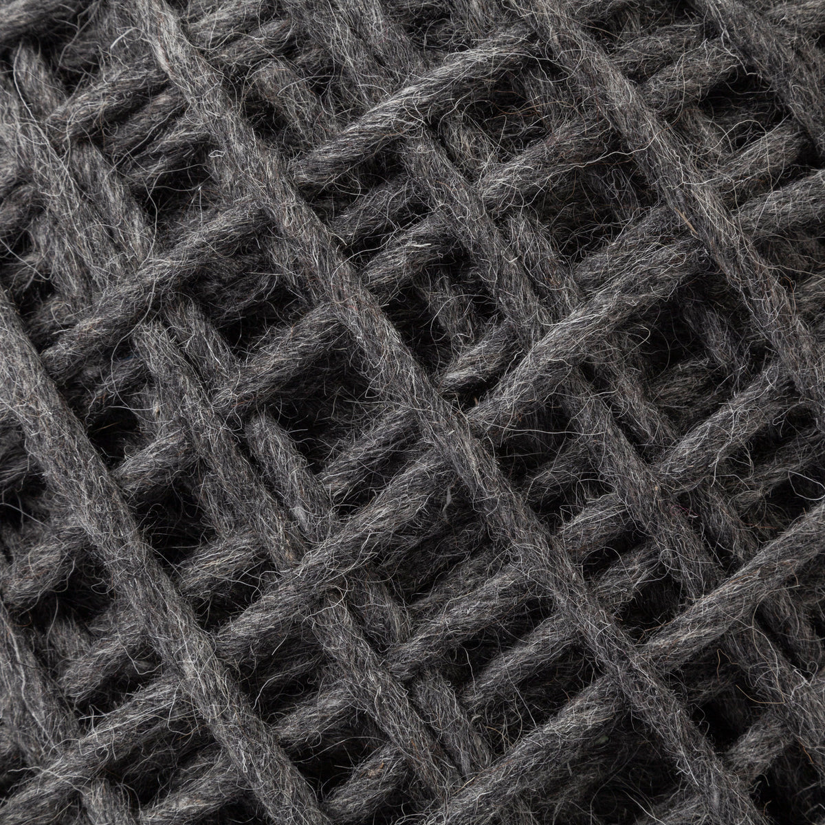 Allium Dark Gray Handwoven Wool Cylindrical Pouf - Ornate Home