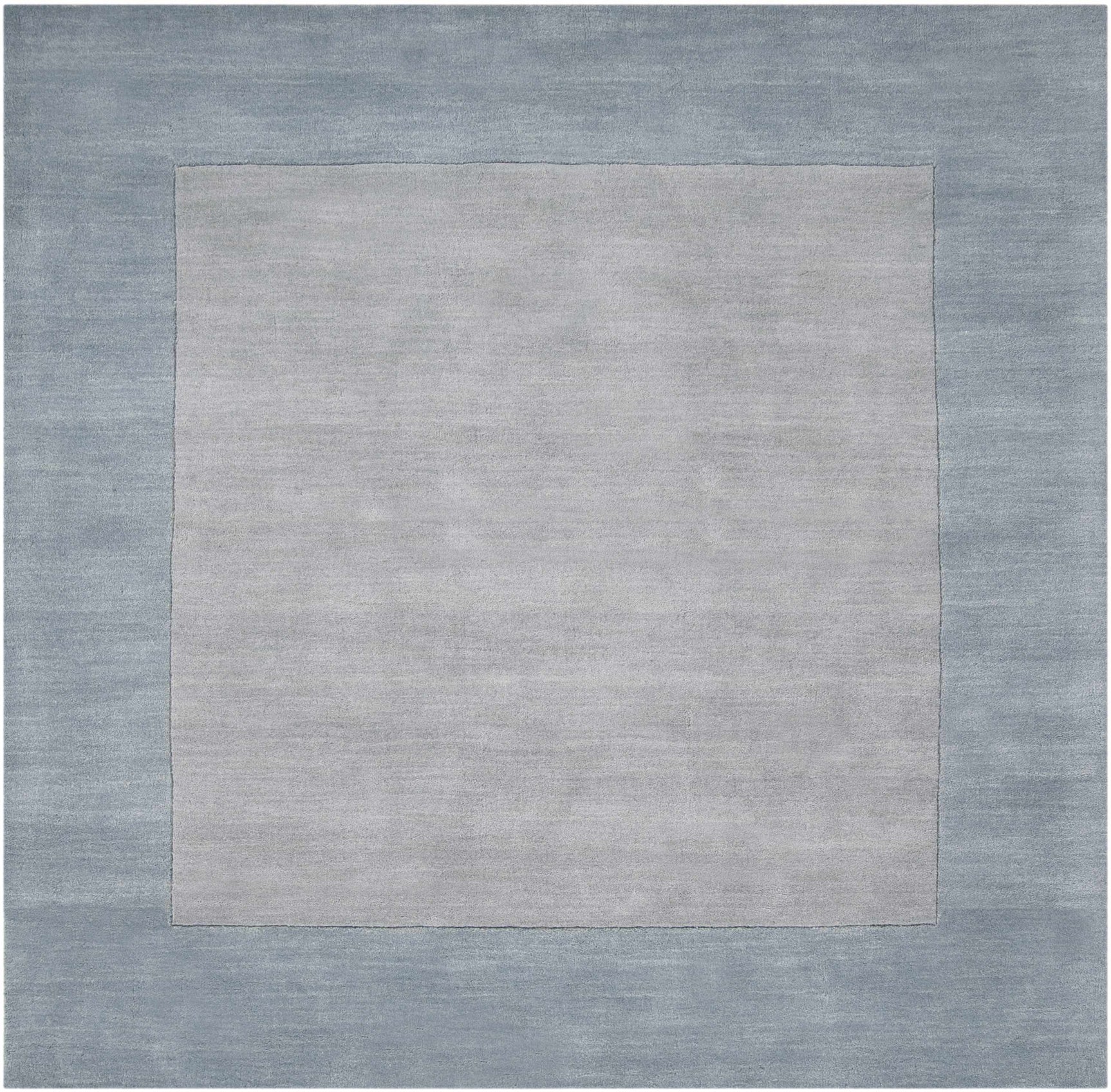 Arkabutla Solid Blue Bordered Wool Rug - Ornate Home