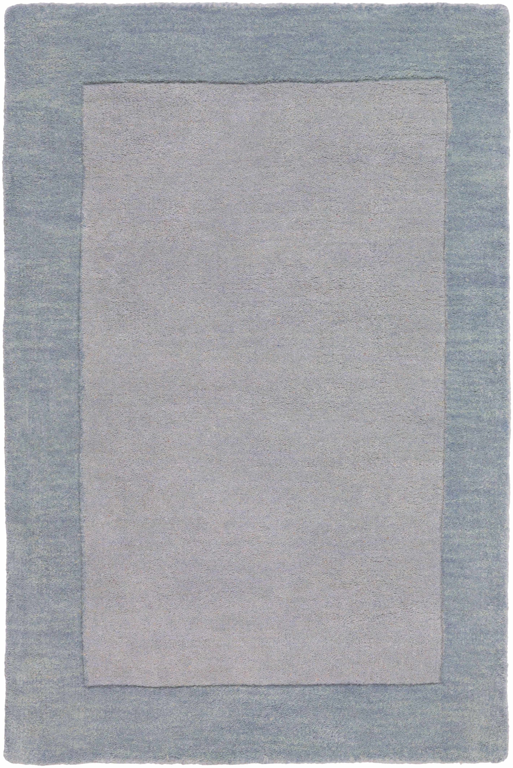 Arkabutla Solid Blue Bordered Wool Rug - Ornate Home