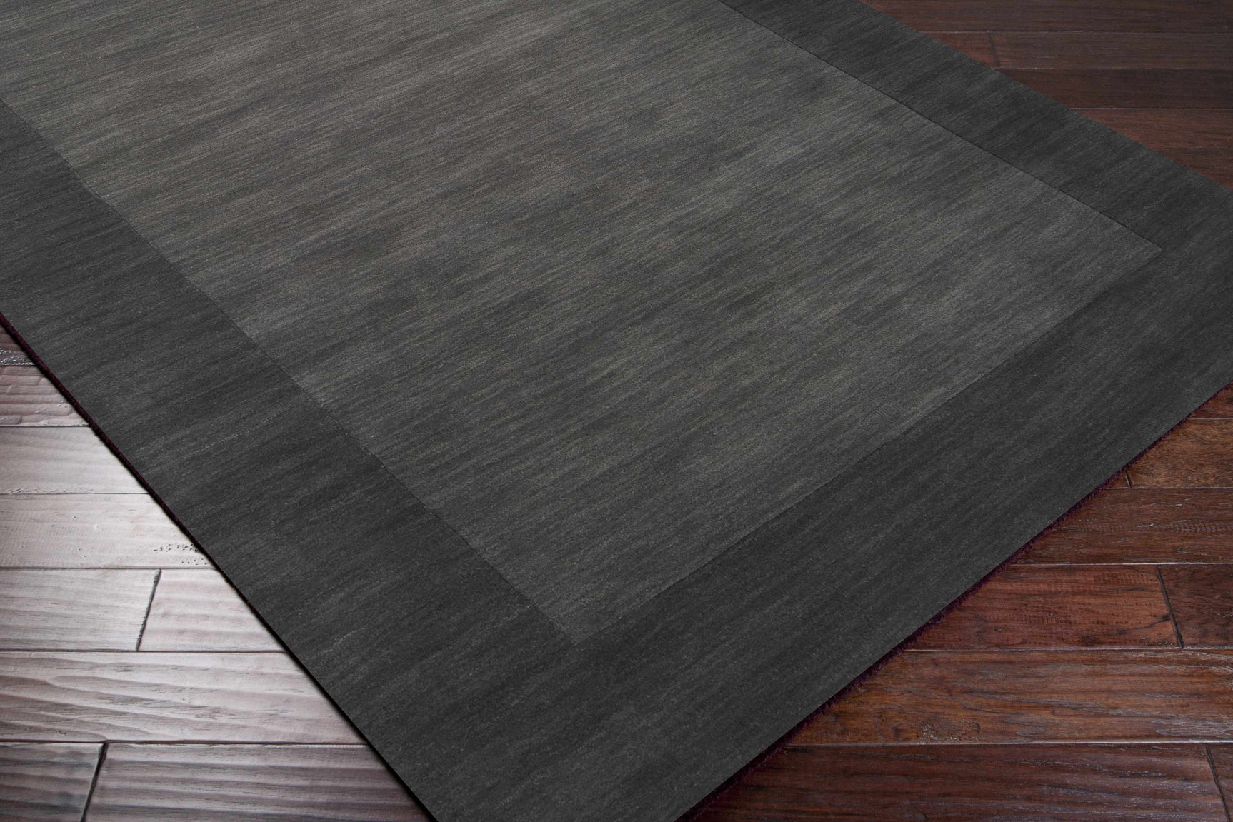 Bordered Solid Black Charcoal Wool Rug - Ornate Home