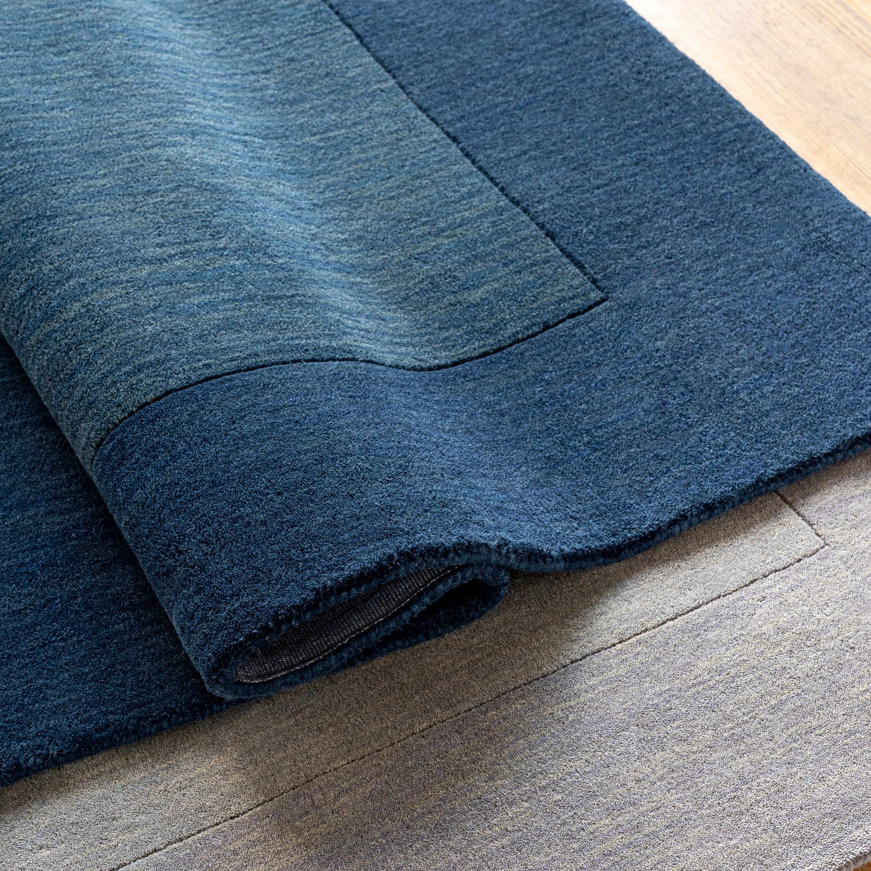 Bordered Solid Ink Blue Wool Rug - Ornate Home