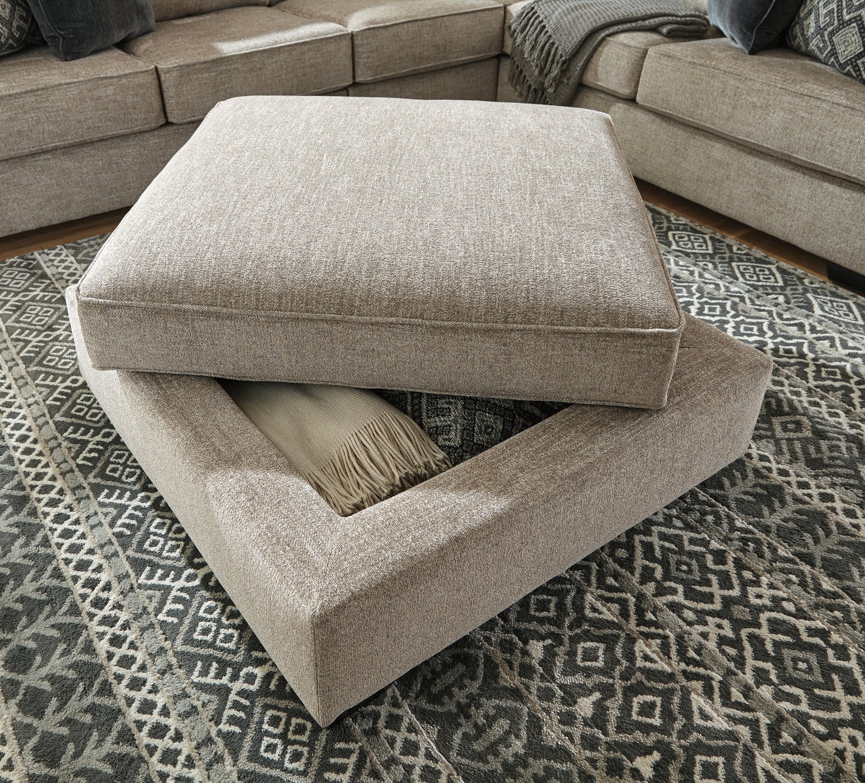 Bovarian Stone 3-Piece Sectional and Ottoman - Ornate Home