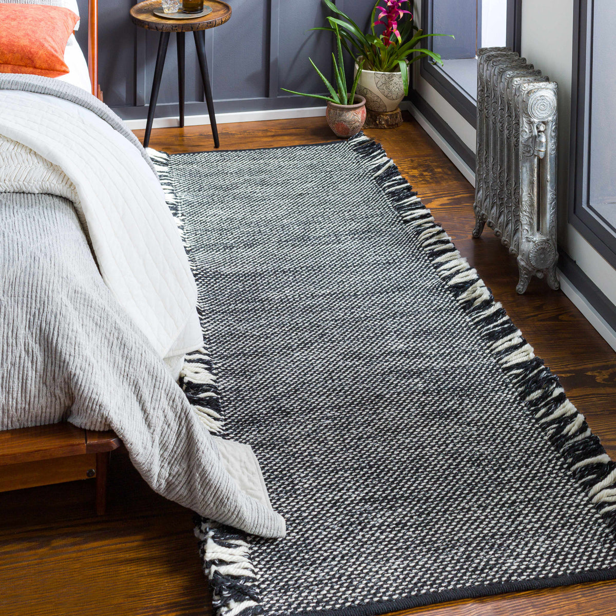 Boyden Black Area Rug with Tassels - Clearance - Ornate Home