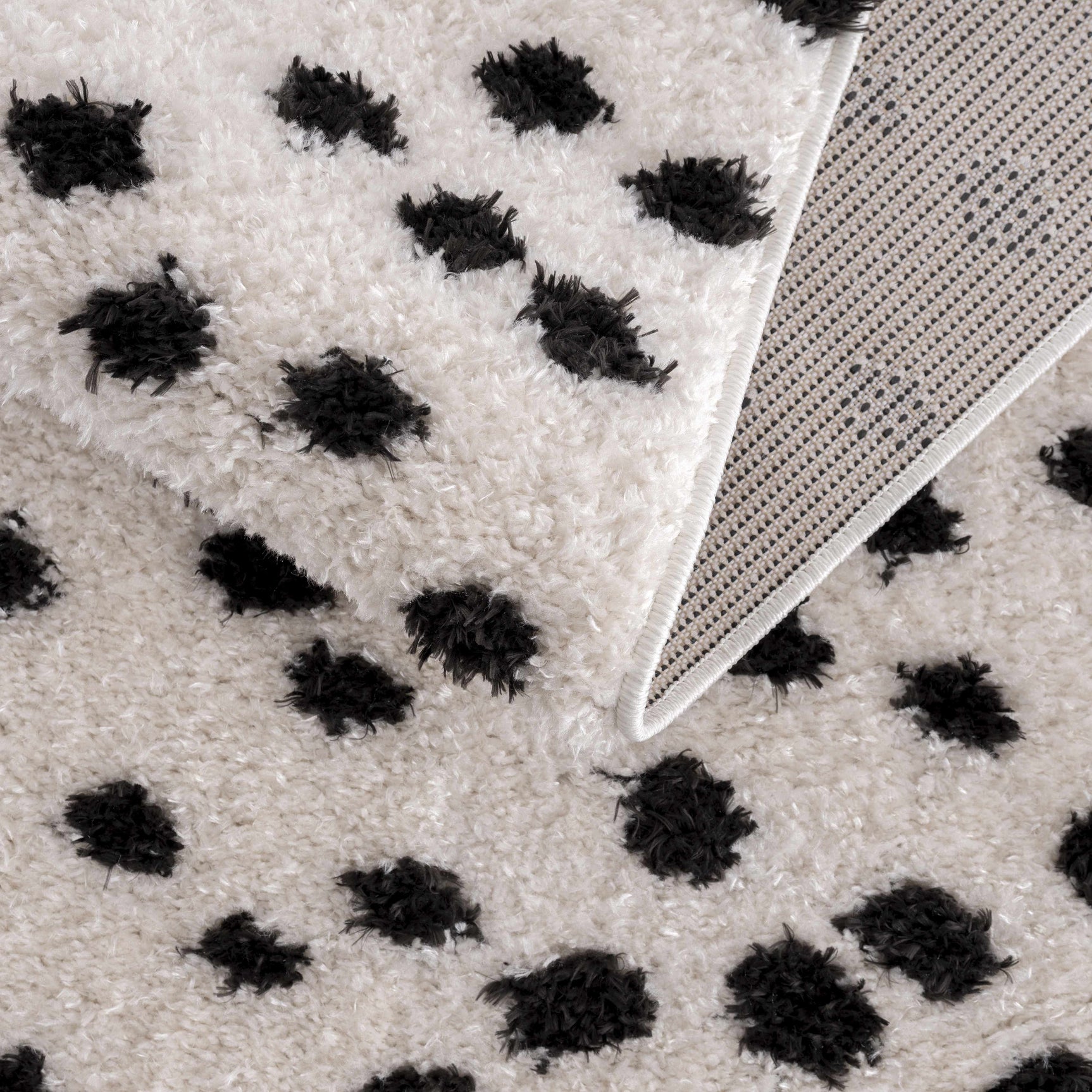 Cansu Black & White Dotted Area Rug - Ornate Home