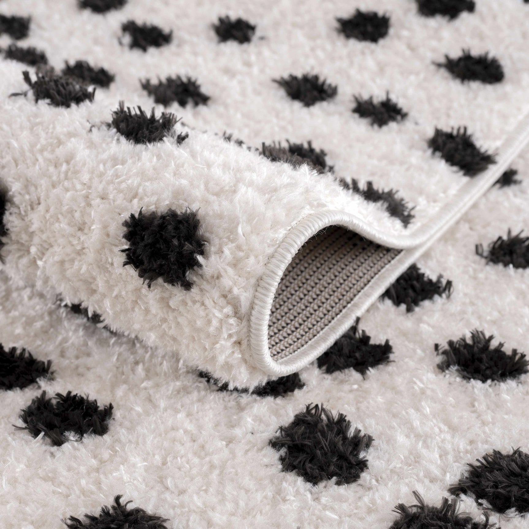 Cansu Black & White Dotted Area Rug - Ornate Home