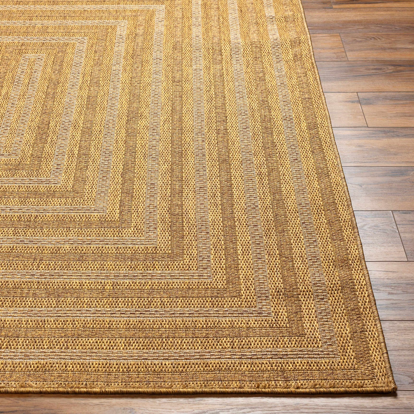 Dyami Flatweave Faux Jute Outdoor Rug - Ornate Home