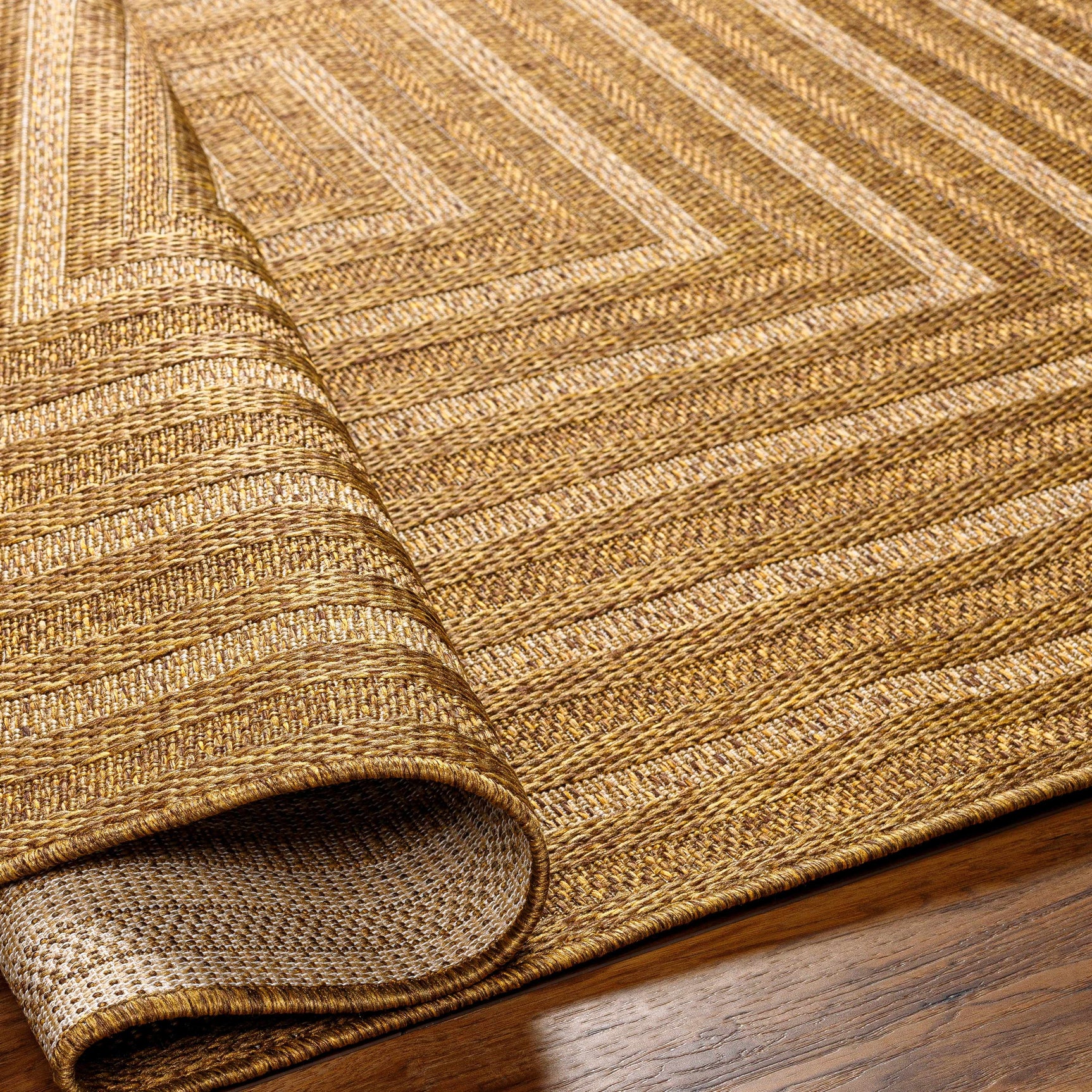 Dyami Flatweave Faux Jute Outdoor Rug - Ornate Home