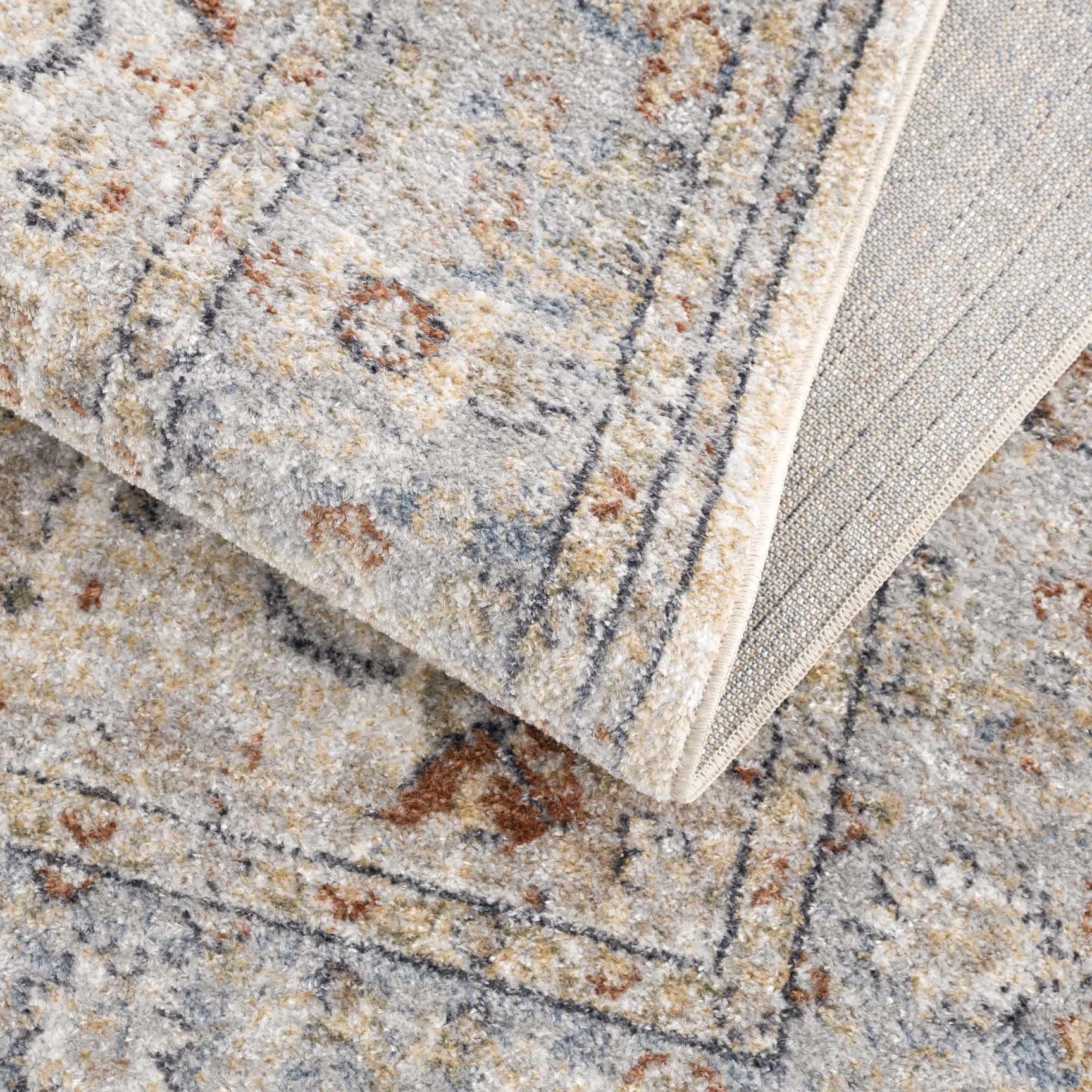 Emke Cream Washable Area Rug - Ornate Home