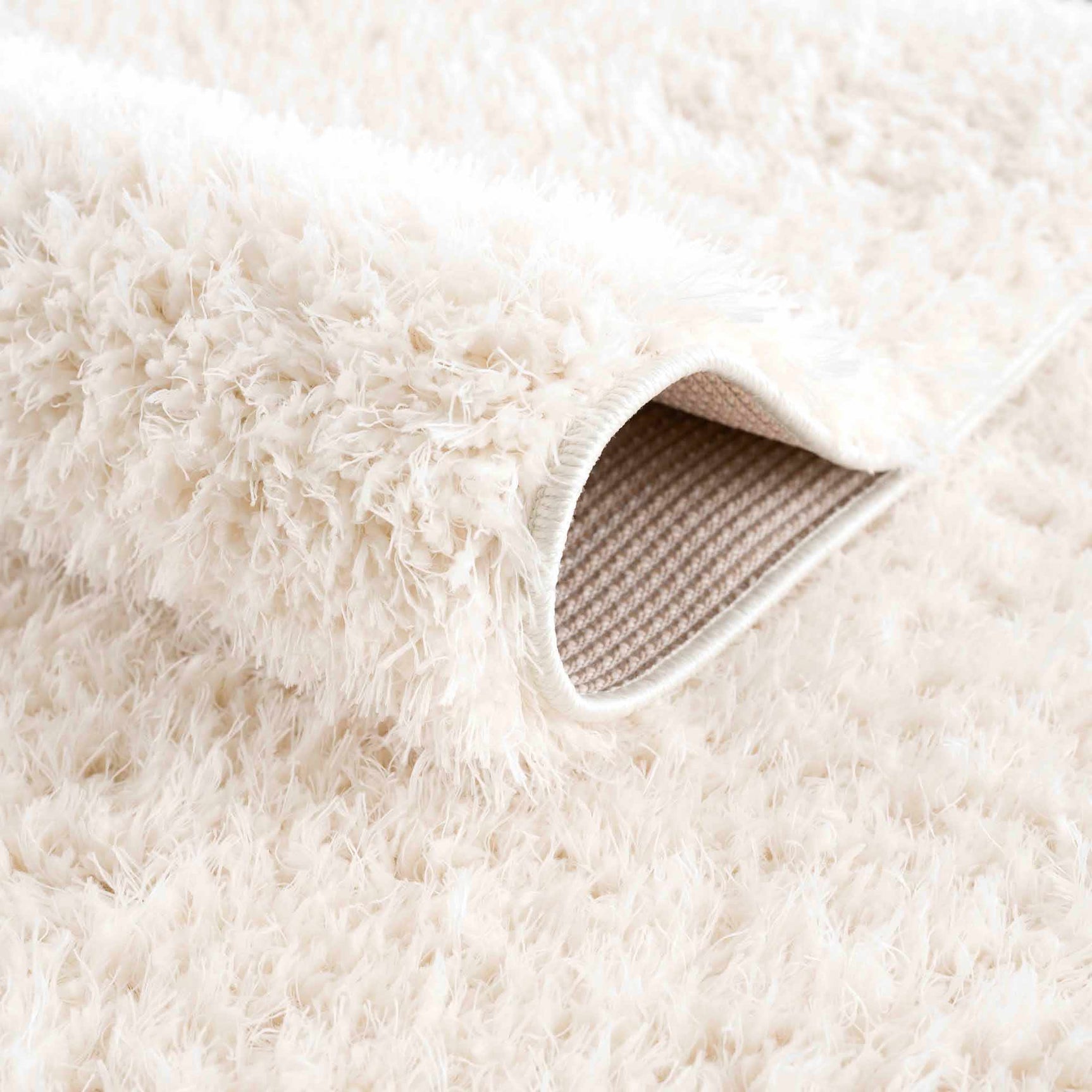 Faina Solid Cream Shag Washable Area Rug - Clearance - Ornate Home