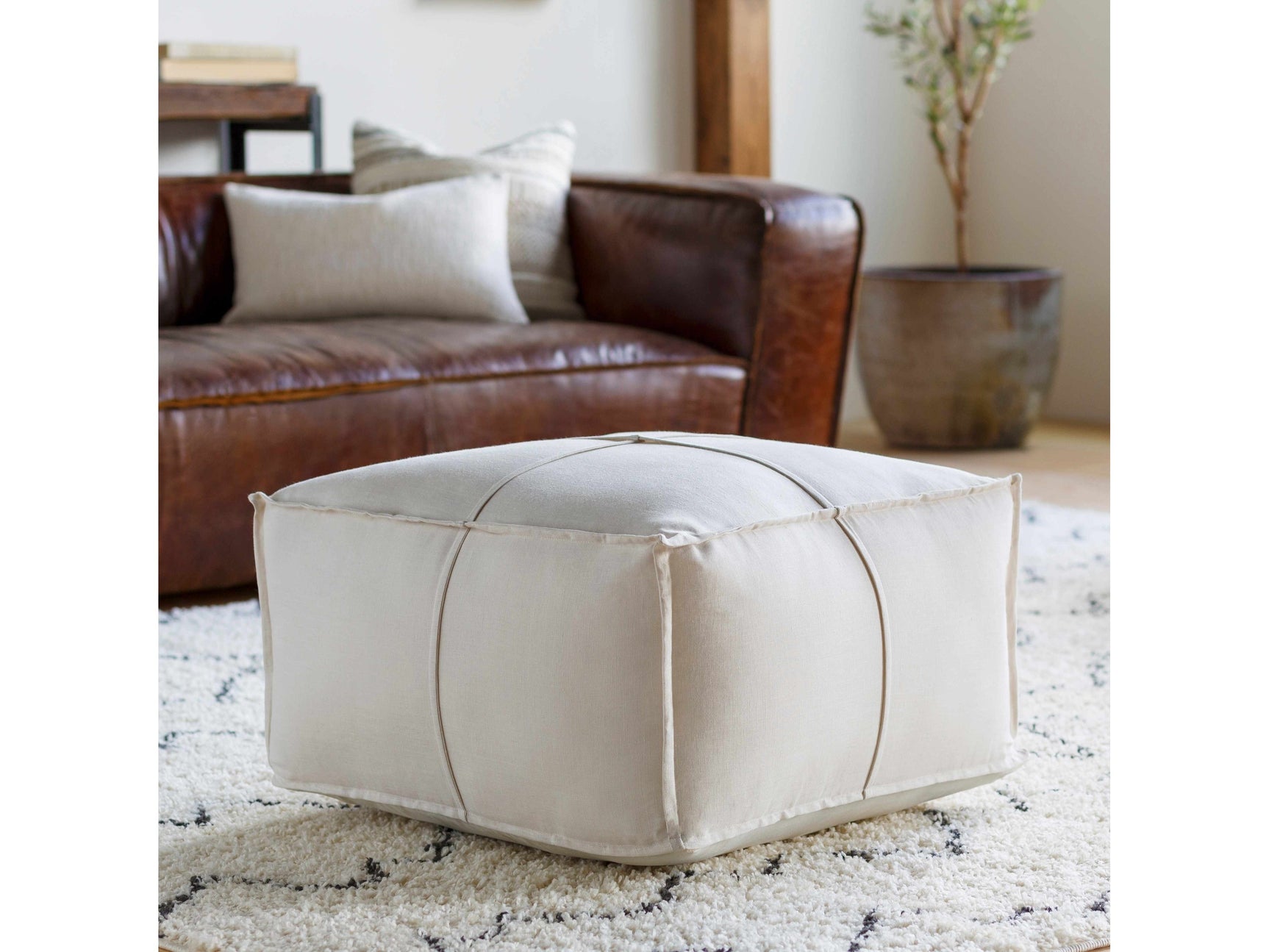 Friendsville Solid & Striped Ivory Pouf - Ornate Home