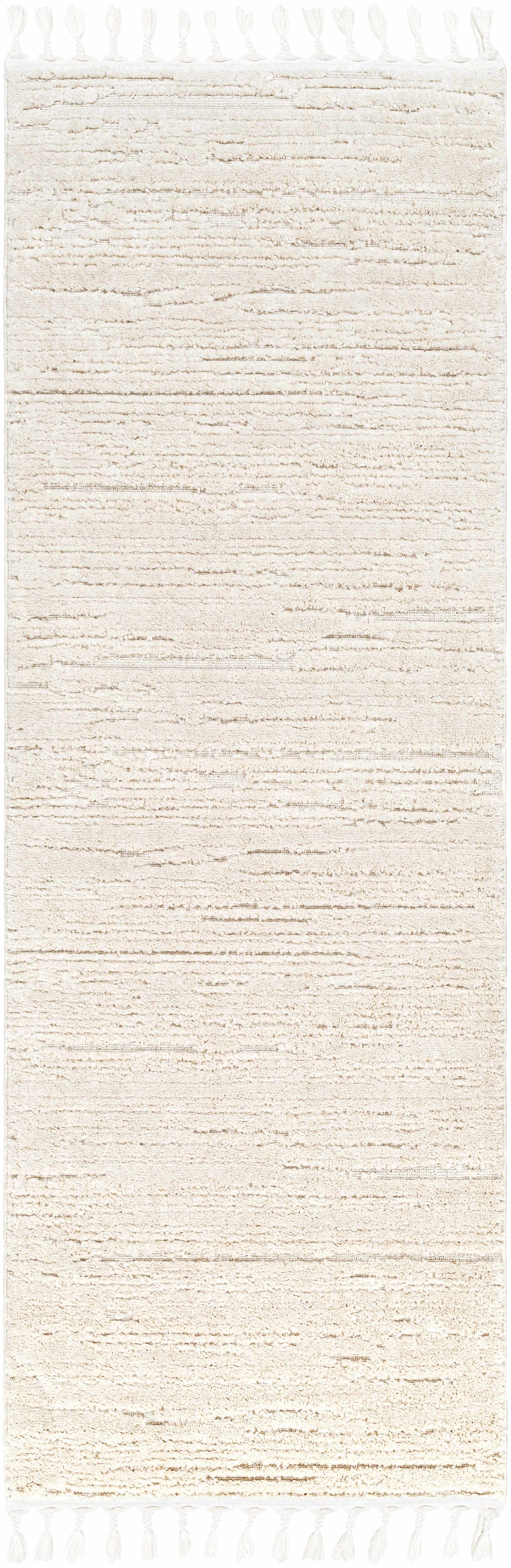 Ibarra Textured Ivory High/Low Pile Rug with Tassels - Ornate Home