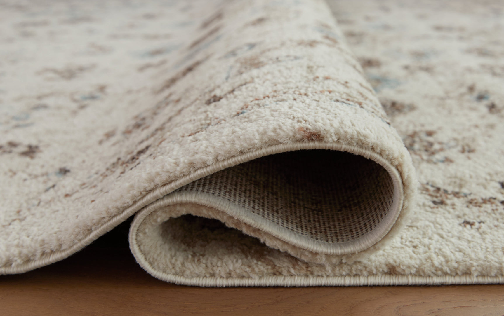 Jossler Ivory/Brown/Teal 5' x 7' Rug (Online Special Price) - Ornate Home