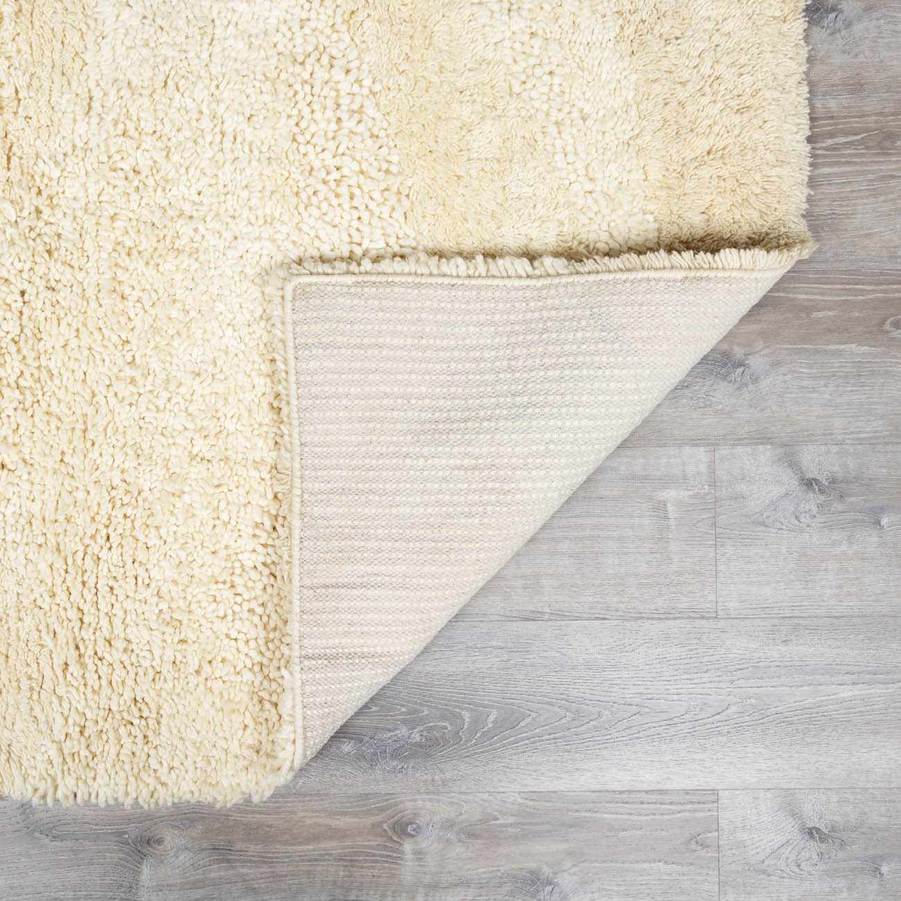 Kettering Solid Cream Wool Shag Rug - Ornate Home