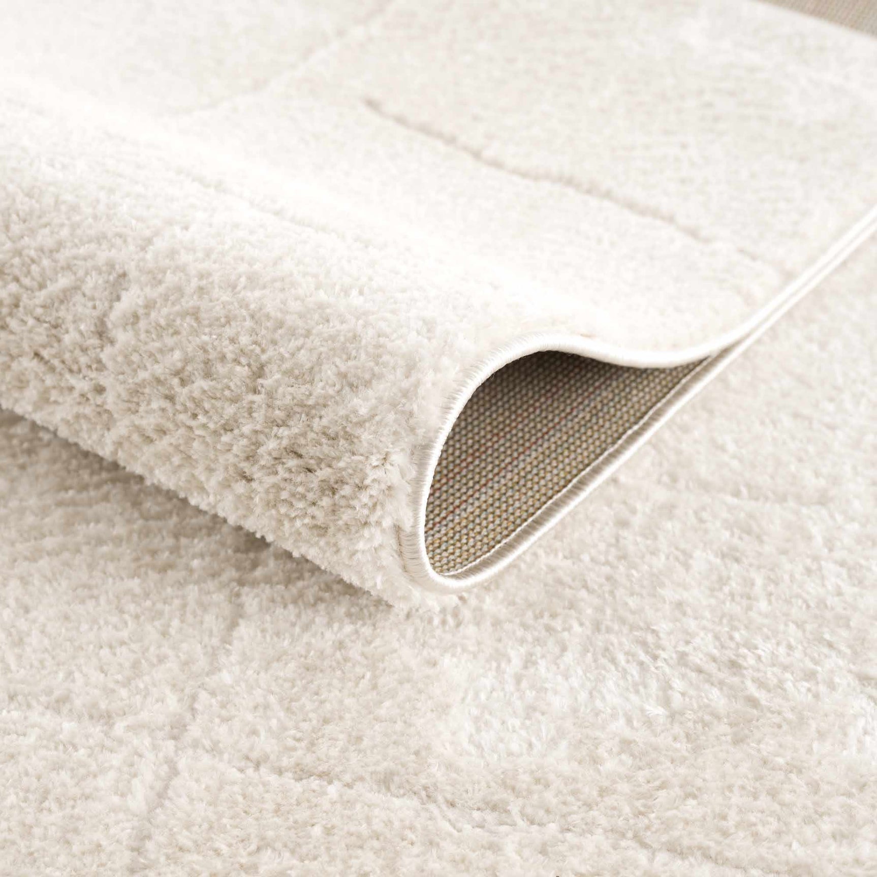 Koume Ivory Area Rug - Ornate Home