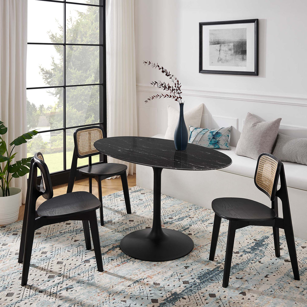 Lippa Black 54" Oval Faux Marble Dining Table - Ornate Home