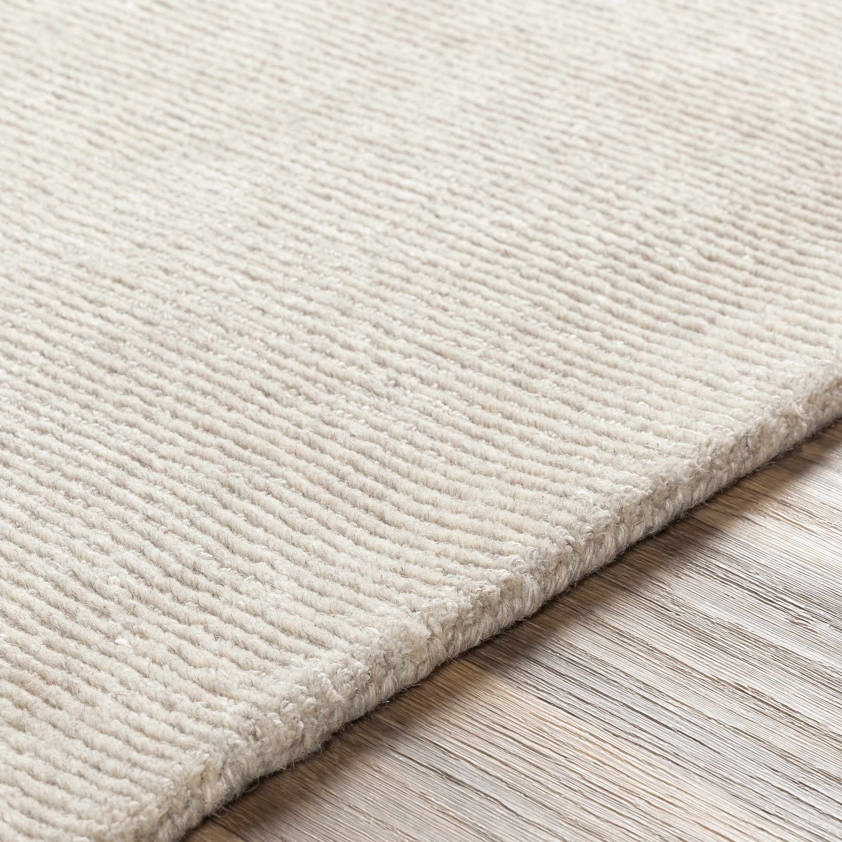 Mariba Ivory Wool Area Rug - Ornate Home