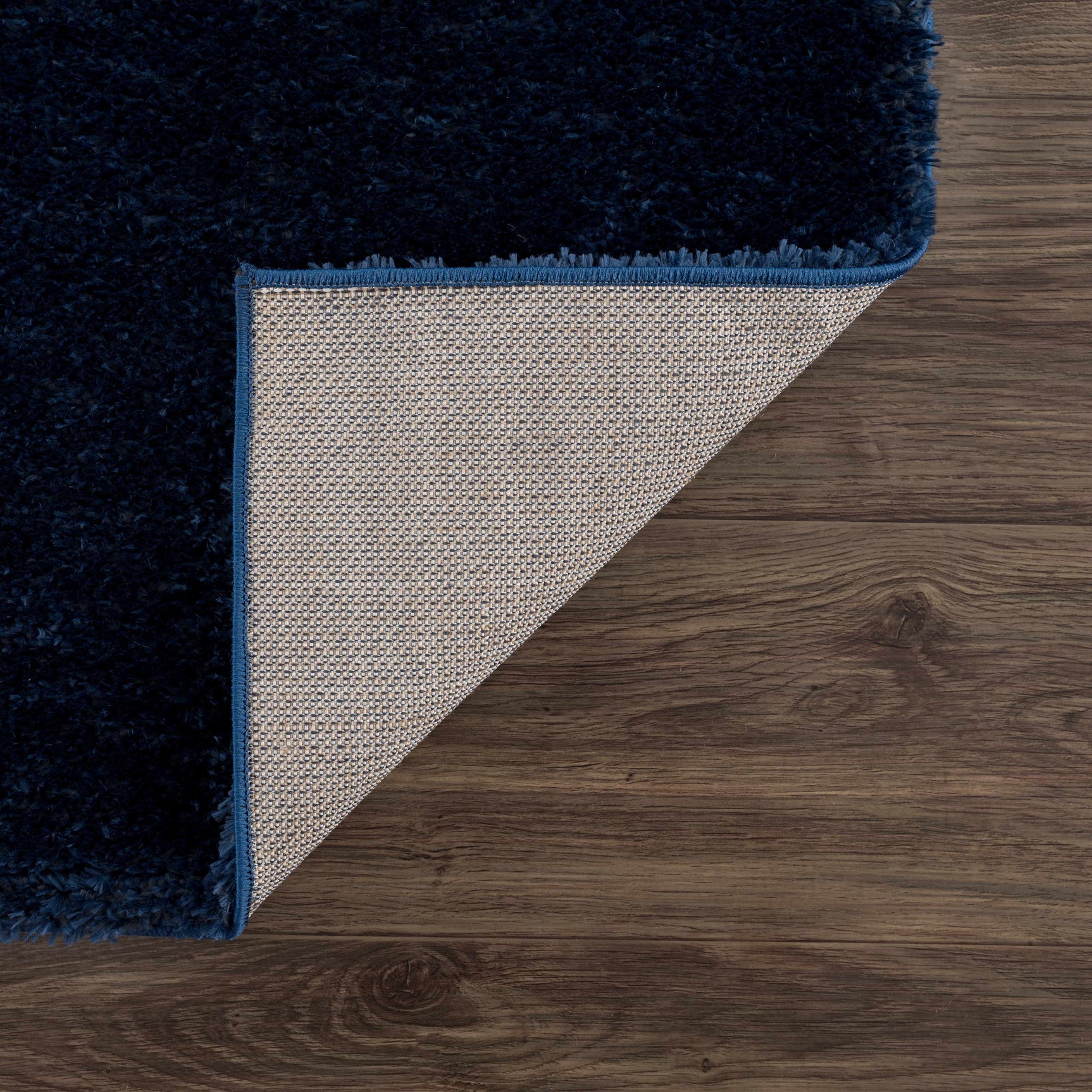 Navero Dark Blue Subtle Wavy Abstract Modern Minimalist Polyester Machine Woven Area Rug - Clearance - Ornate Home