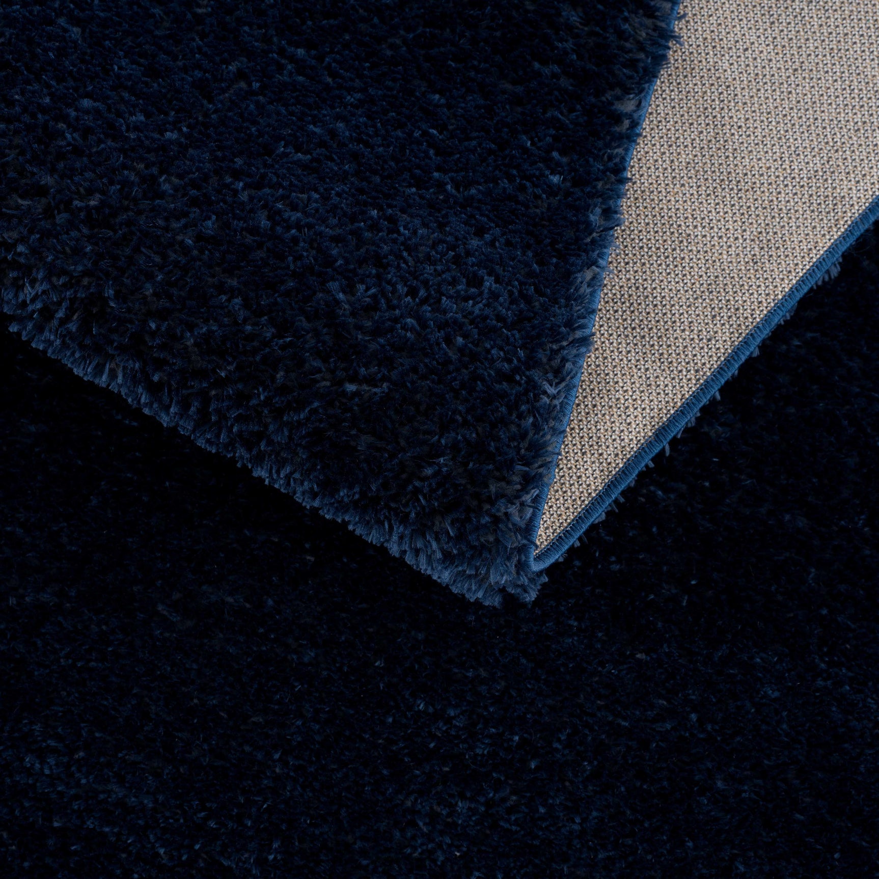 Navero Dark Blue Subtle Wavy Abstract Modern Minimalist Polyester Machine Woven Area Rug - Clearance - Ornate Home
