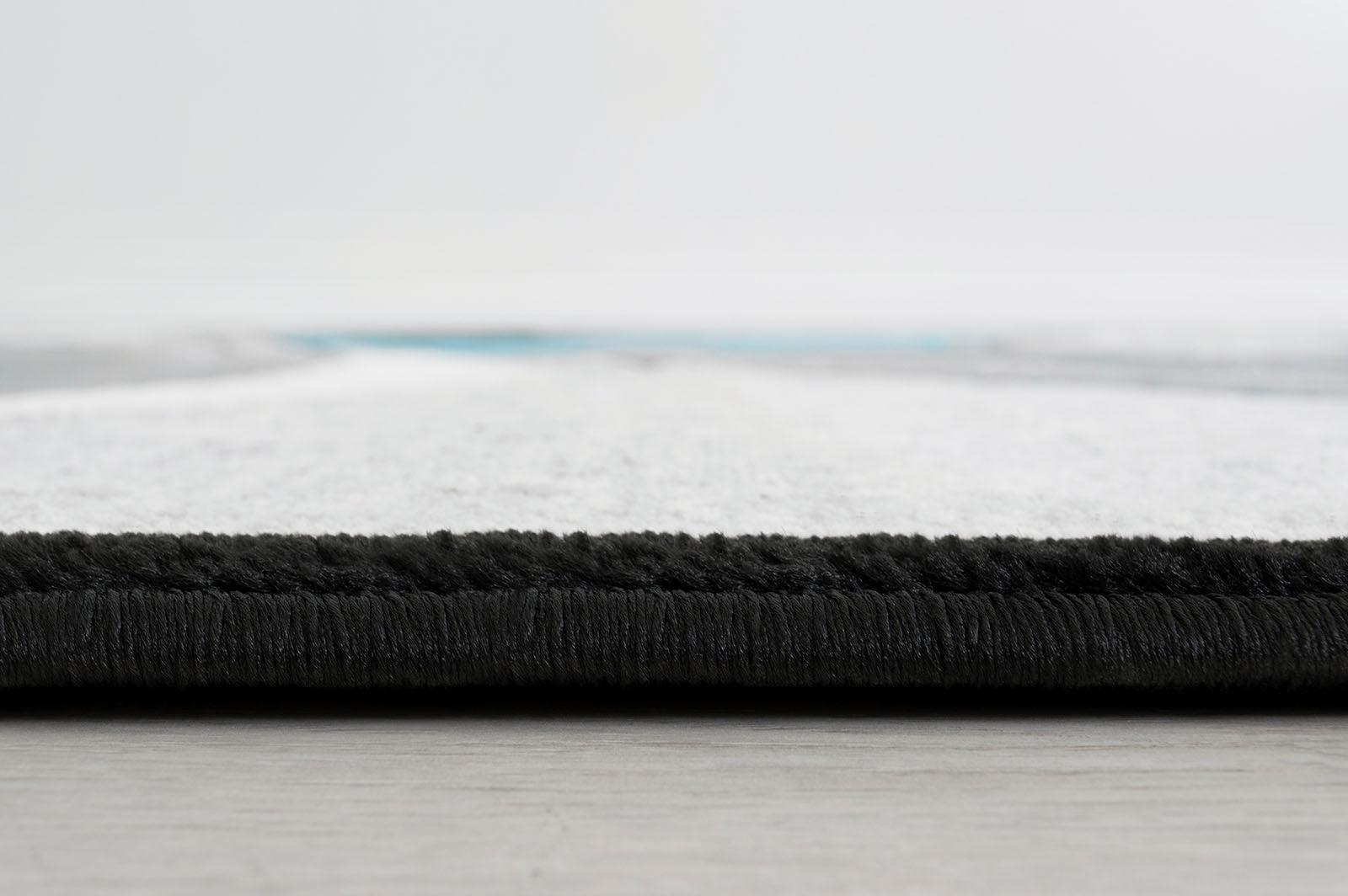 Niksar Turquoise 5' X 7' Area Rug - Ornate Home