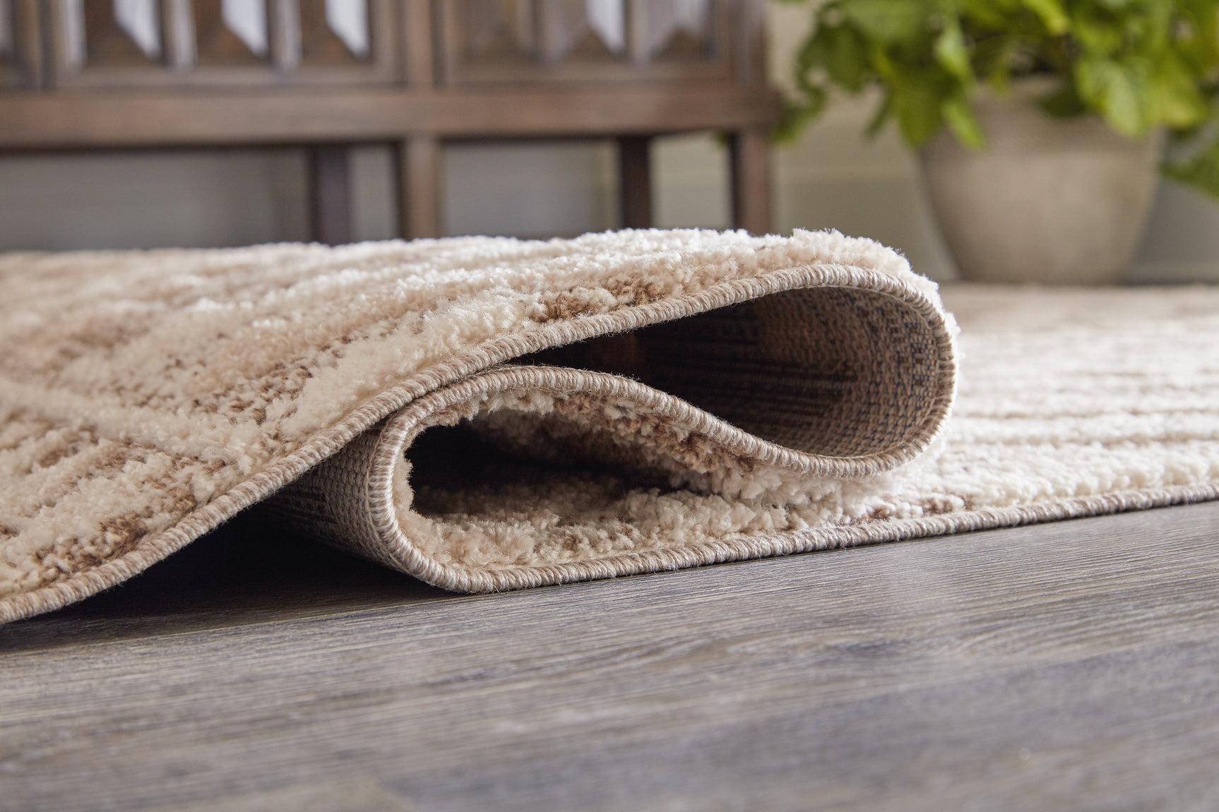 Odedale Tan/Cream 8' x 10' Rug - Ornate Home