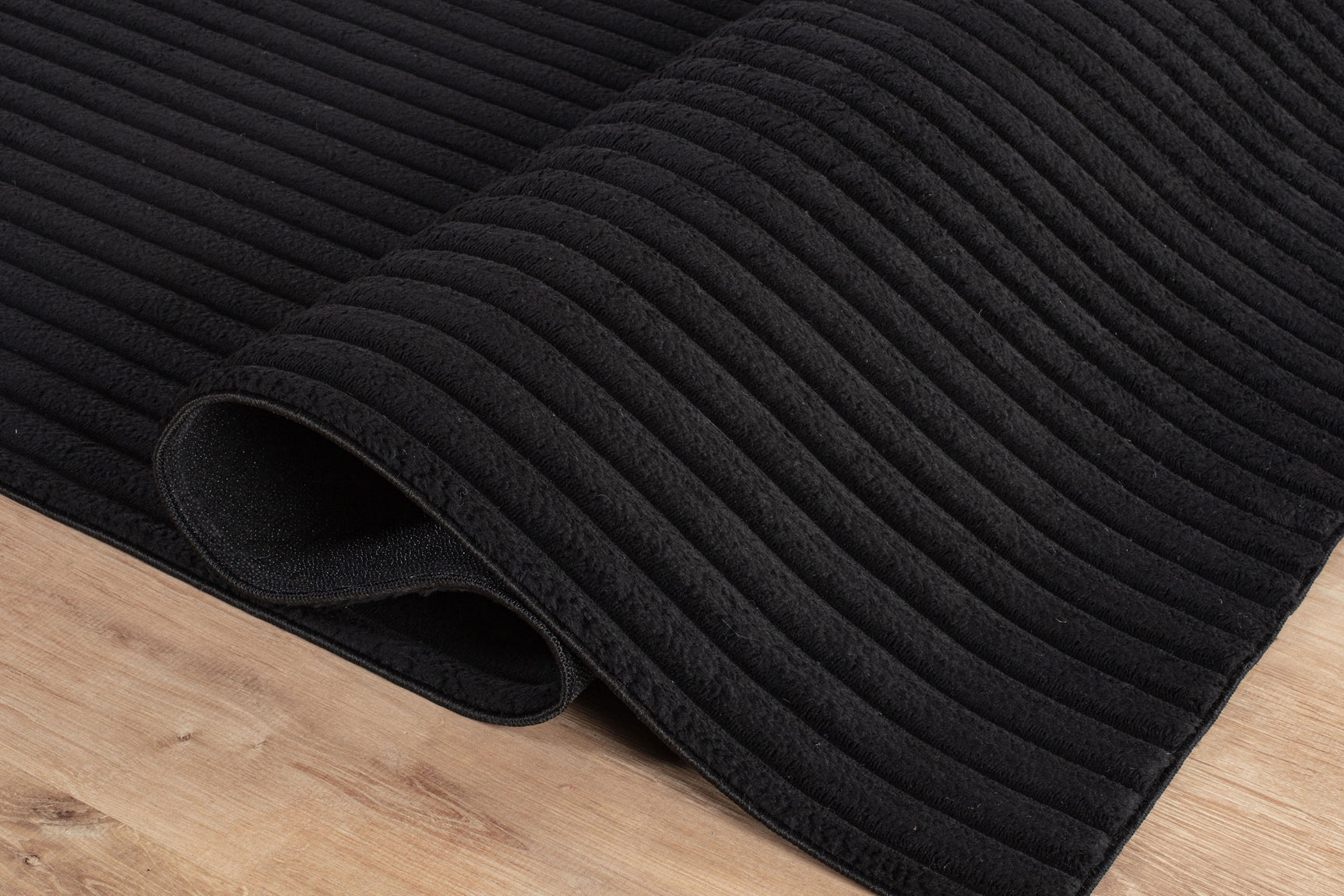 Puff Black Ribbed Ultra Soft Plush Non Slip Washable Area Rugs - Ornate Home