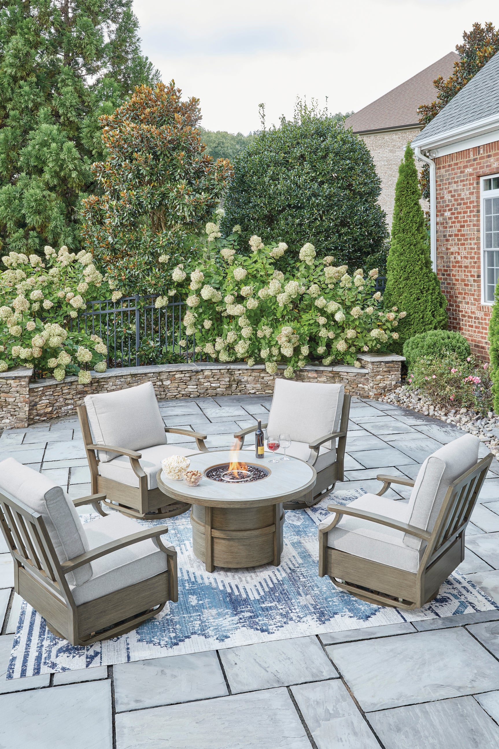 Rainier Ranch Brown/Beige Outdoor Swivel Glider Chair with Cushion - Ornate Home