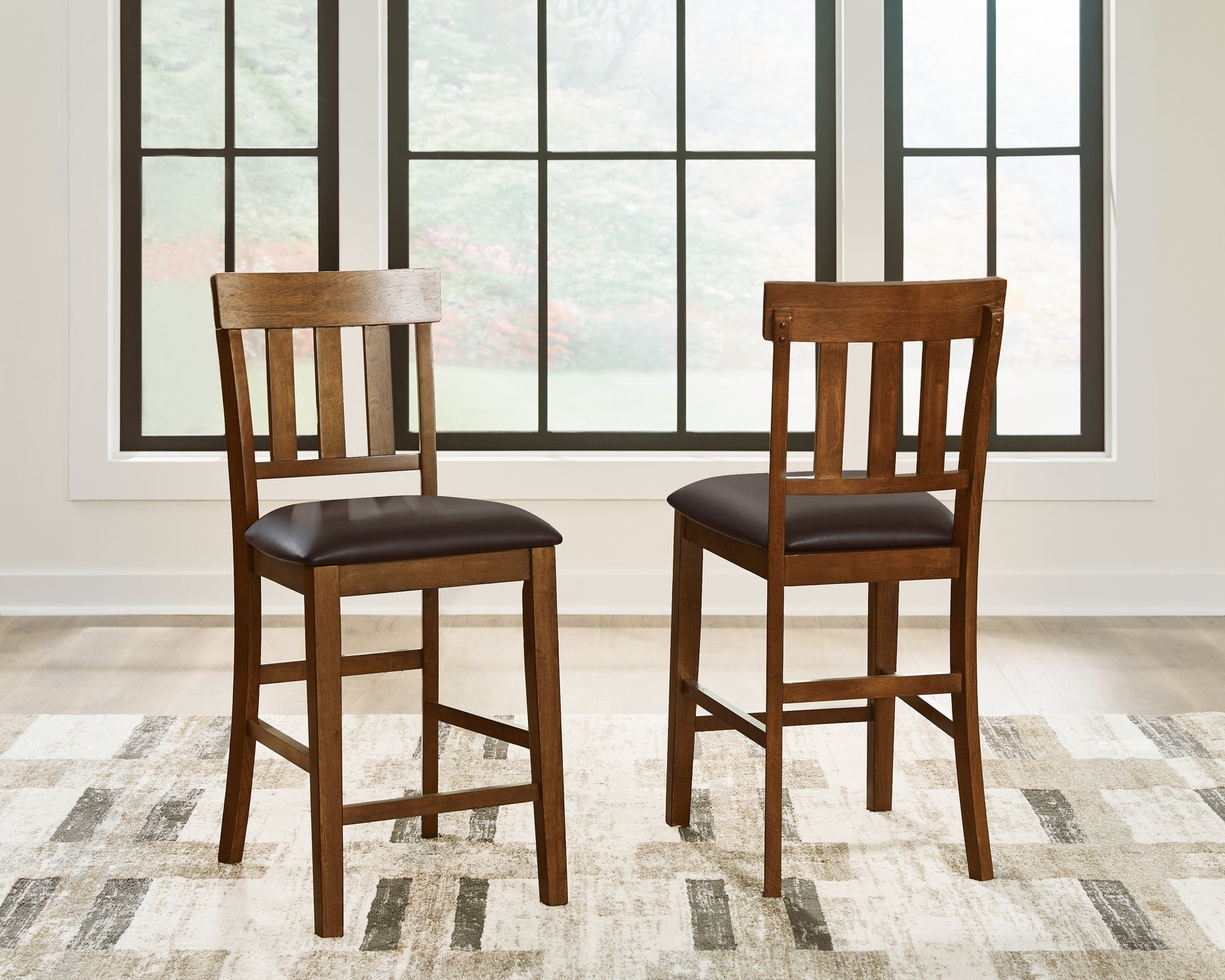 Ralene Medium Brown Counter Height Dining Table and 4 Barstools - Ornate Home