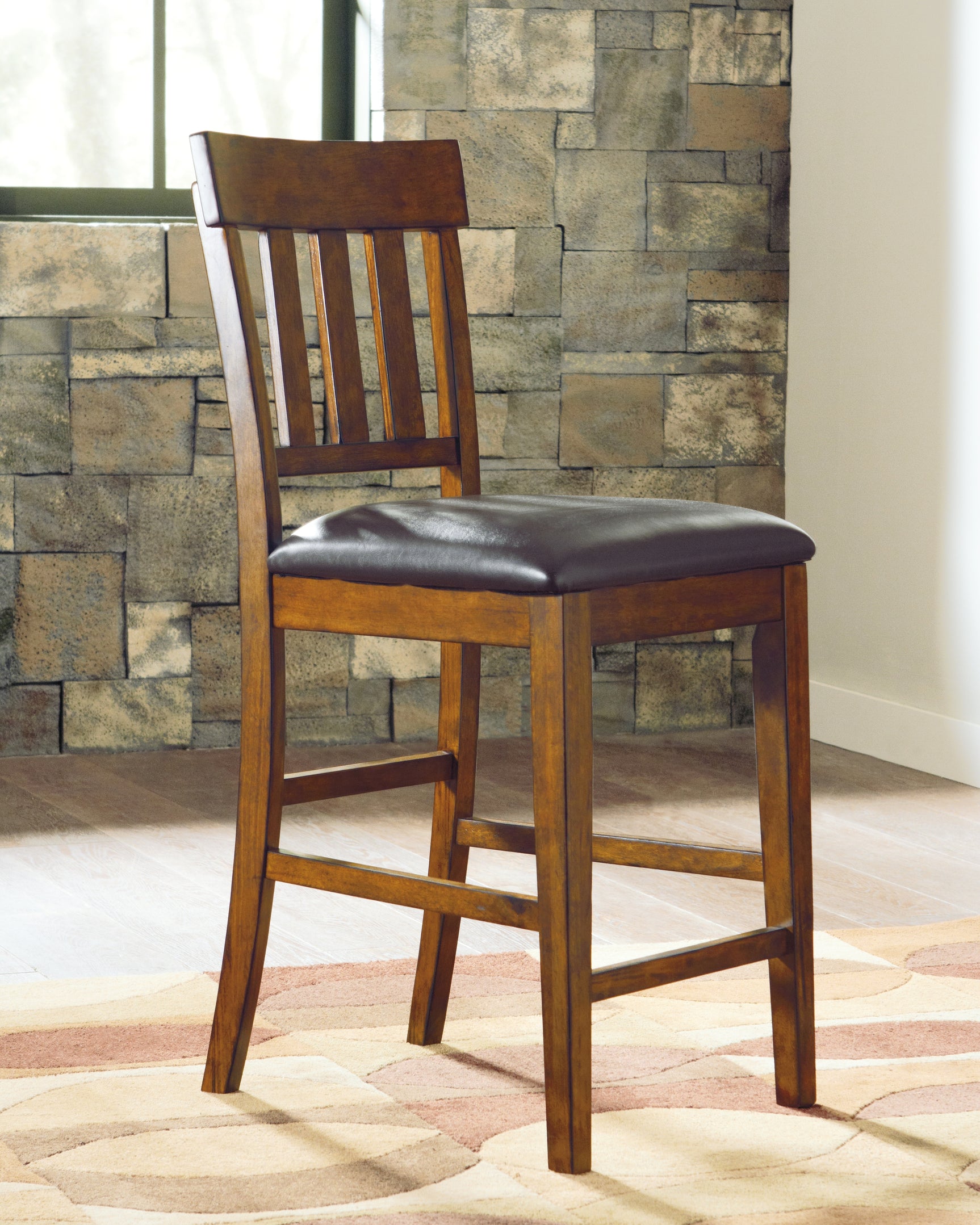 Ralene Medium Brown Counter Height Dining Table and 4 Barstools - Ornate Home