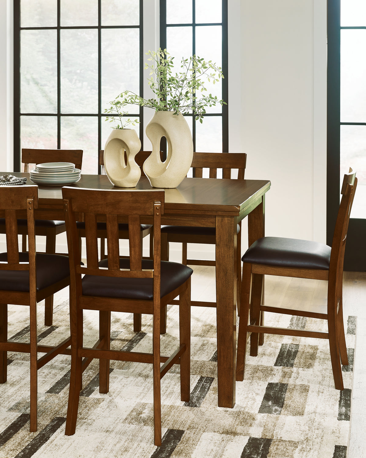 Ralene Medium Brown Counter Height Dining Table and 4 Barstools - Ornate Home