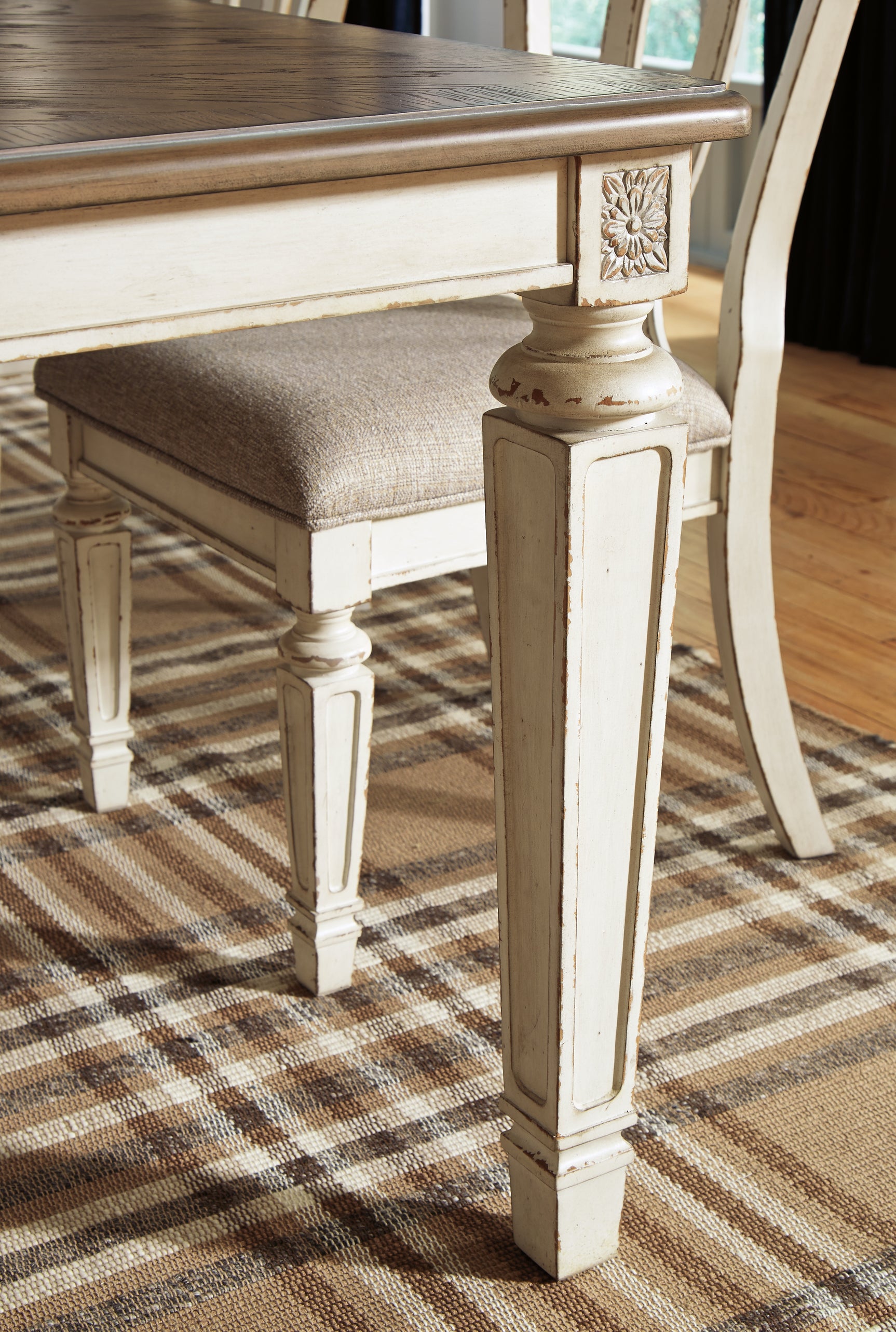 Realyn Chipped White Dining Extension Table and 8 Chairs - Ornate Home