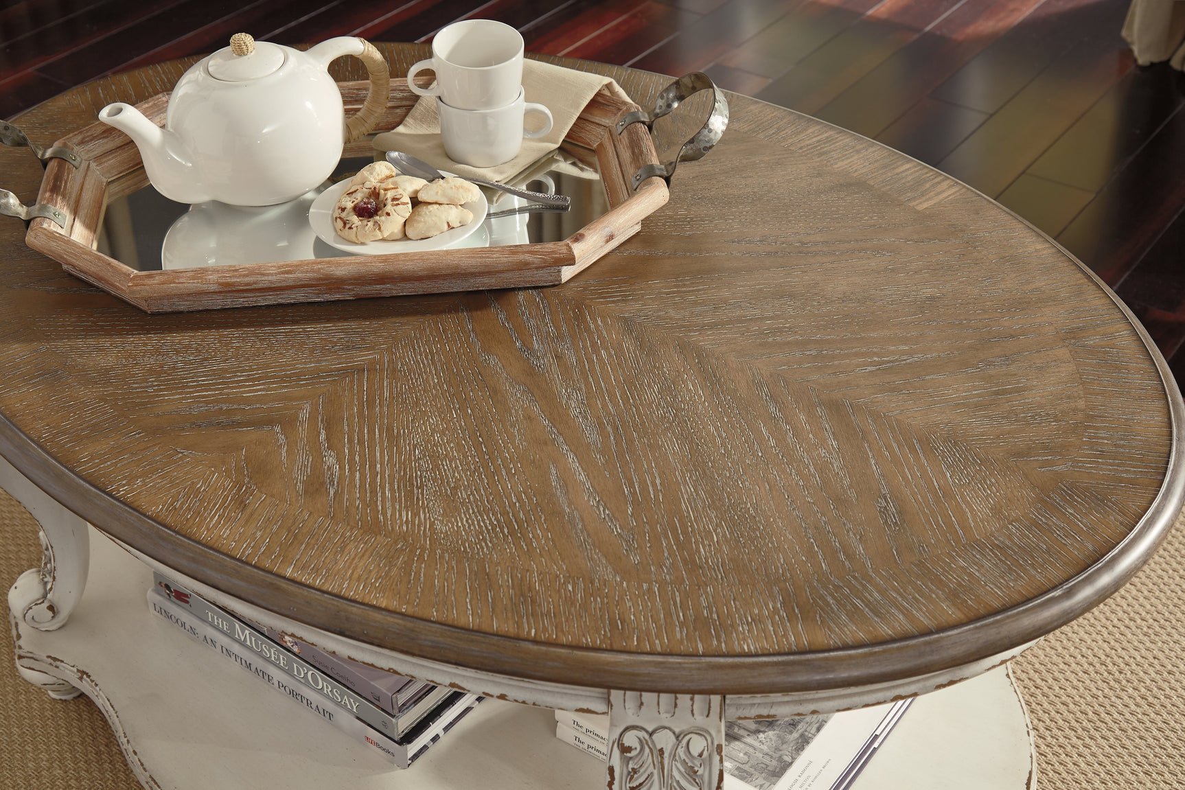Realyn White/Brown Oval Coffee Table (Online Special Price) - Ornate Home