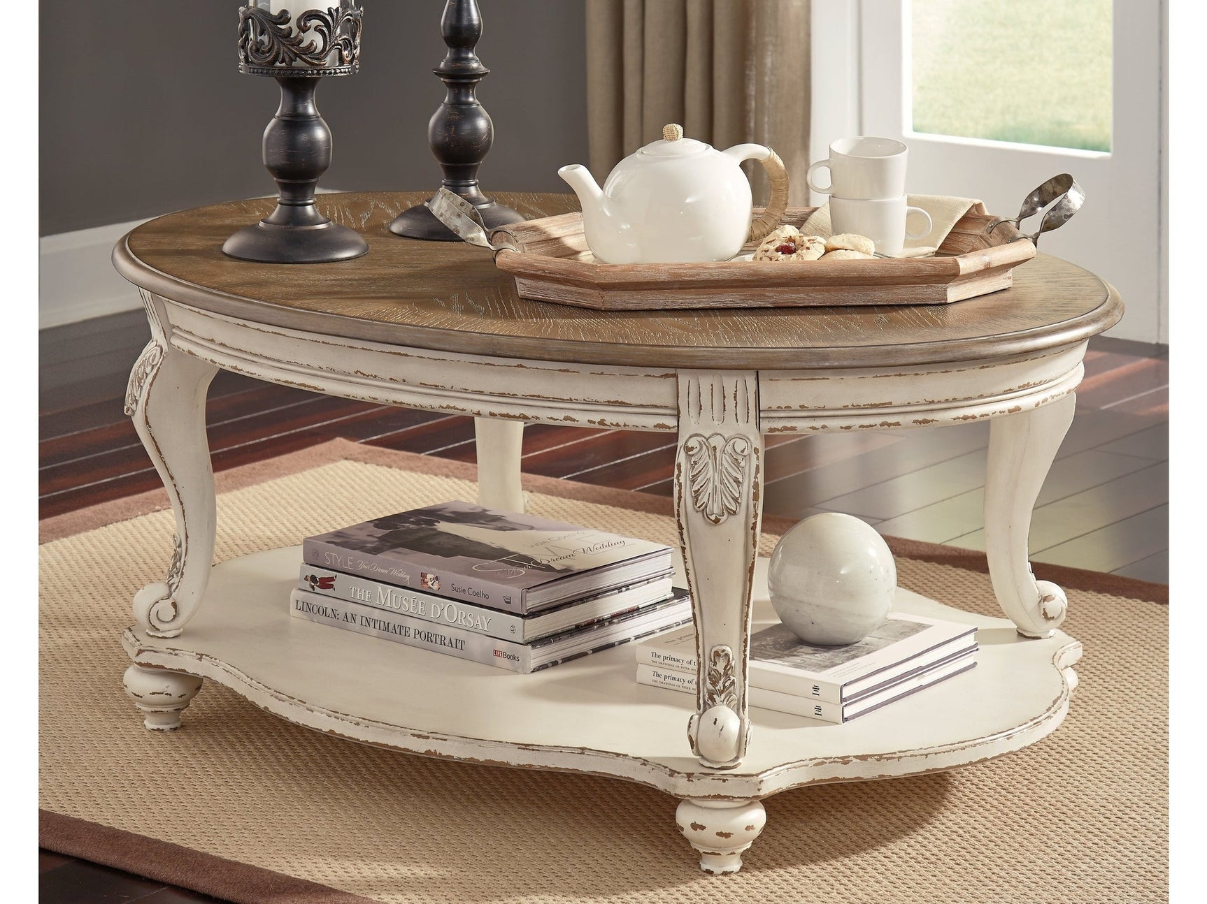 Realyn White/Brown Oval Coffee Table - Ornate Home