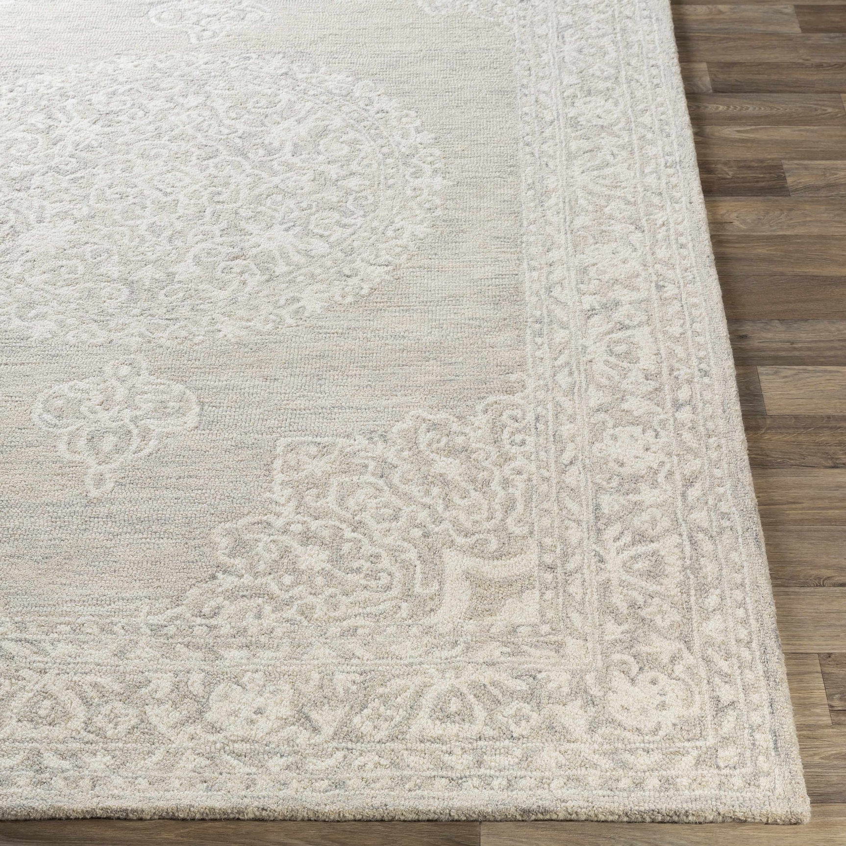 Roessleville Cream Wool Area Rug - Ornate Home