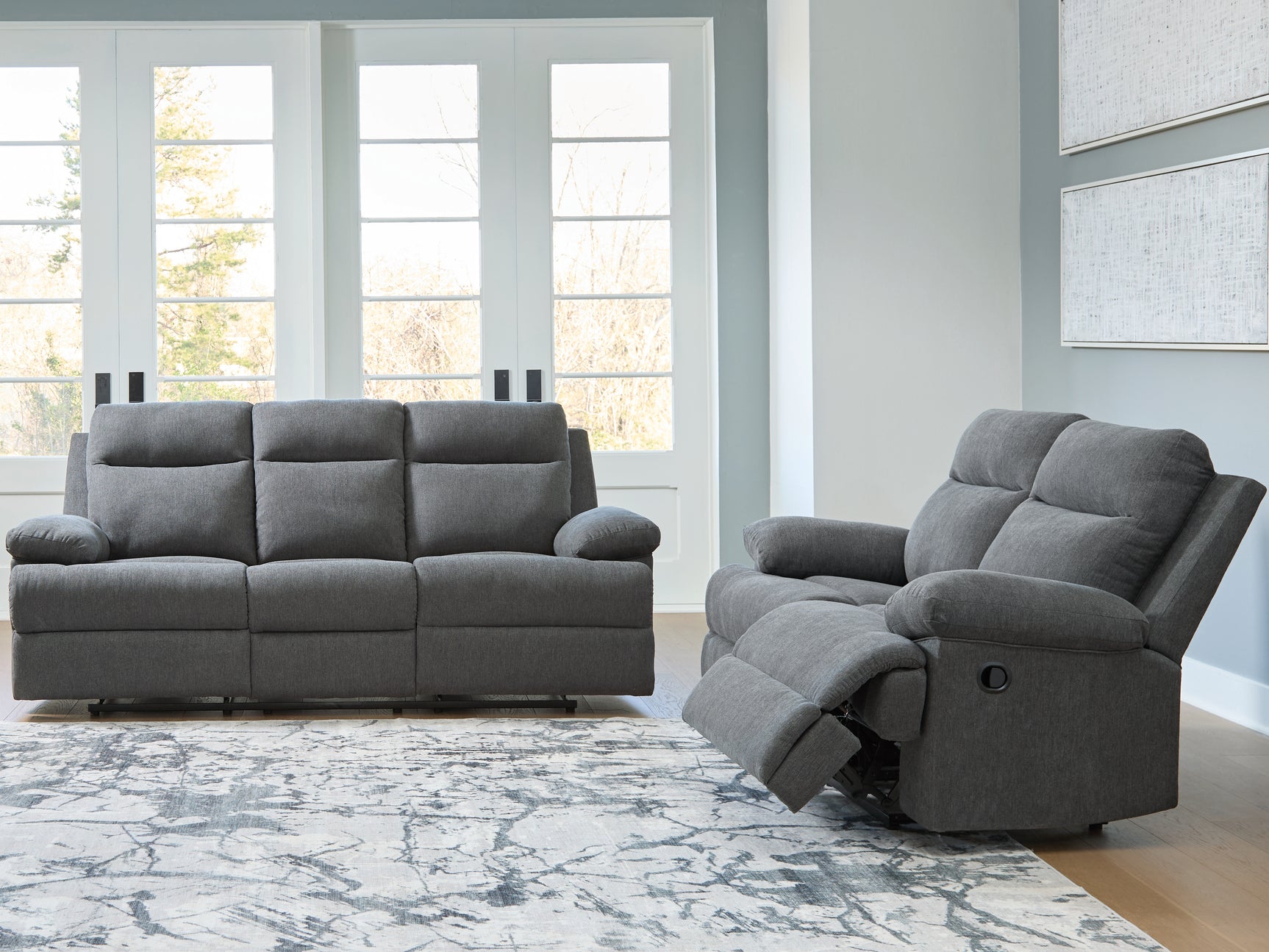 Side-Swipe Charcoal Reclining Sofa and Loveseat - Ornate Home