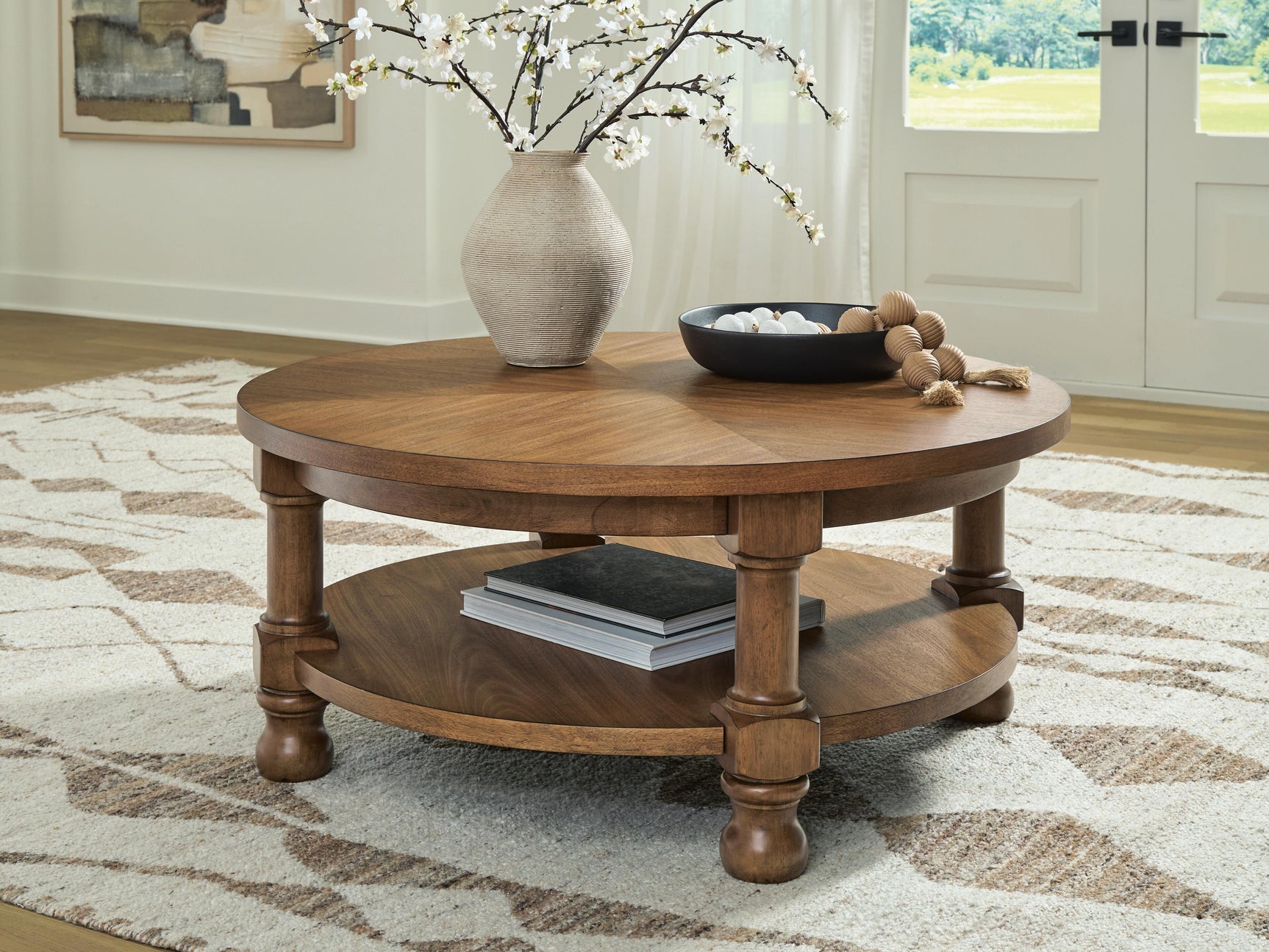 Chadworth Medium Brown Round Cocktail Table (Online Special Price)