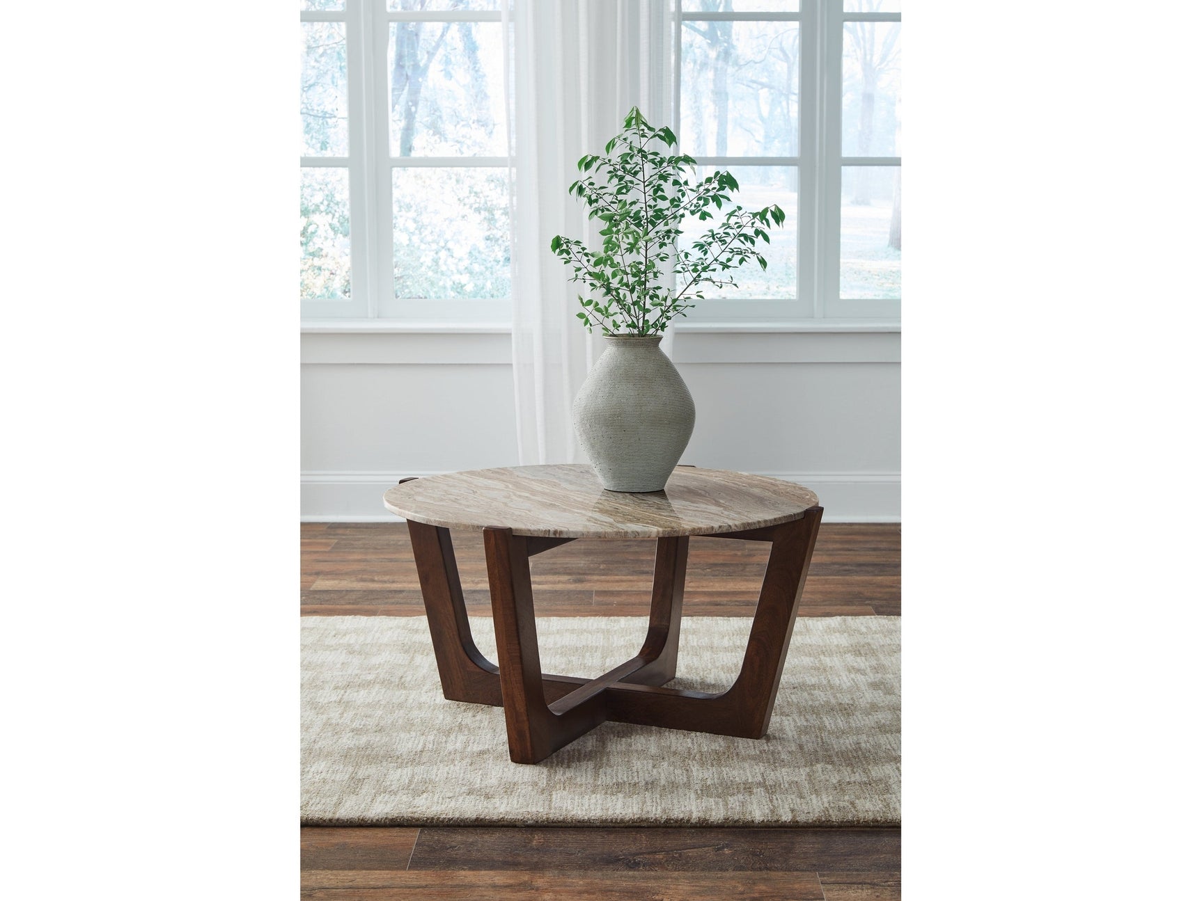 Tanidore Warm Brown Round Cocktail Table - Ornate Home