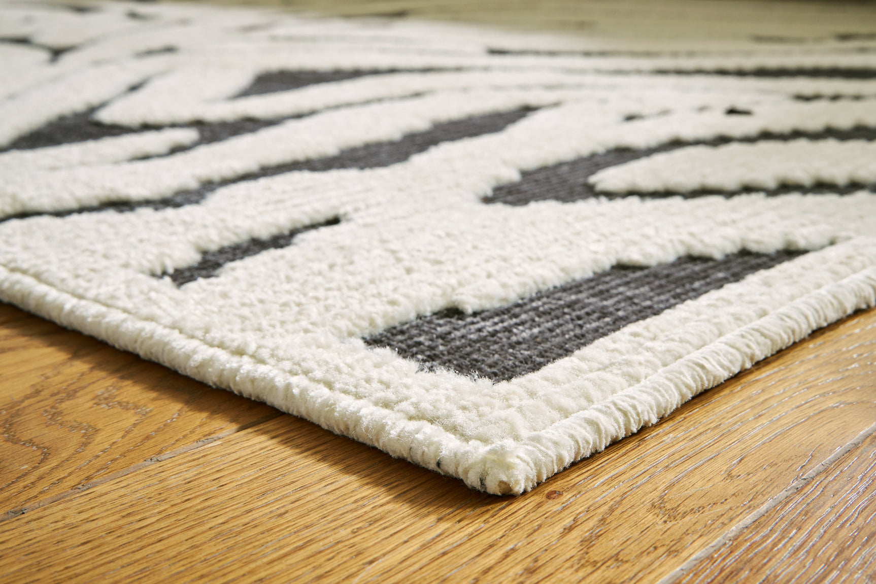 Thomwith Black/Ivory 7'10" x 10'1" Rug (Online Special Price) - Ornate Home