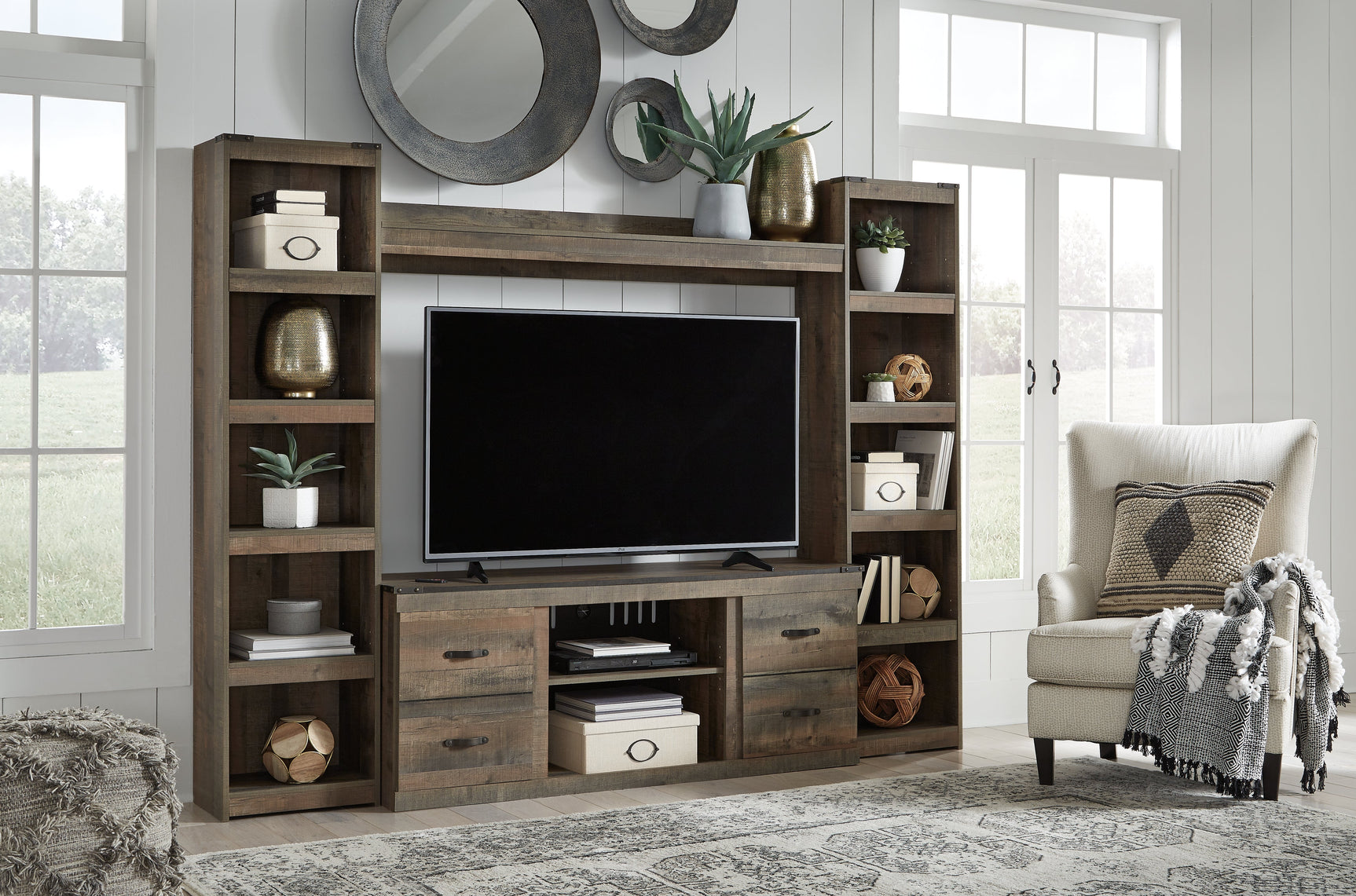 Trinell Brown 4-Piece Entertainment Center - Ornate Home
