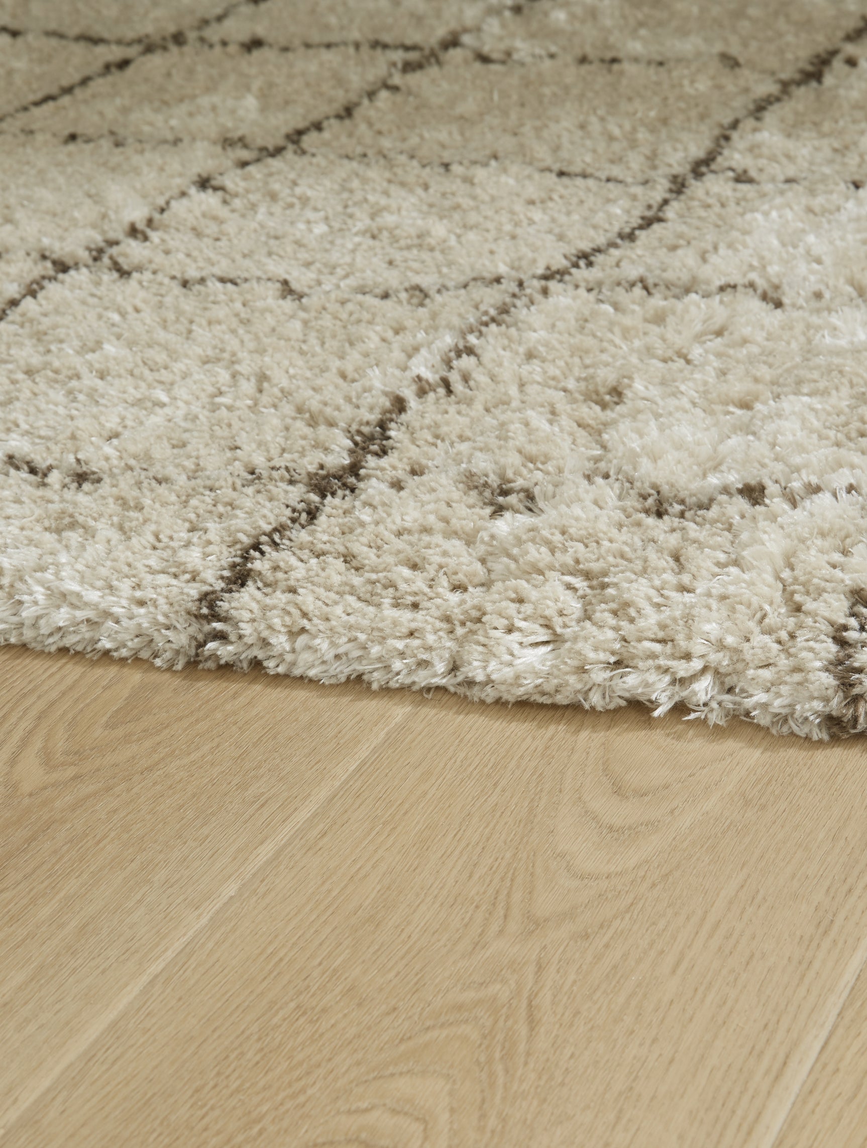 Wrenlow Cream/Brown 5' x 7' Rug - Ornate Home