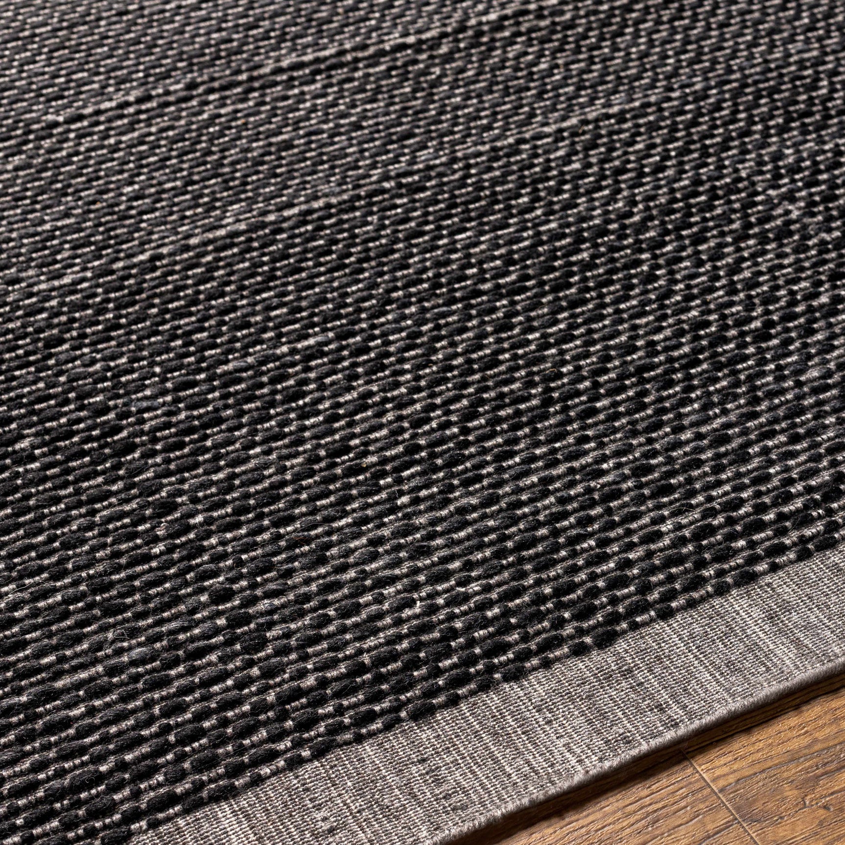 Yong Hand Loomed Black Rug - Clearance