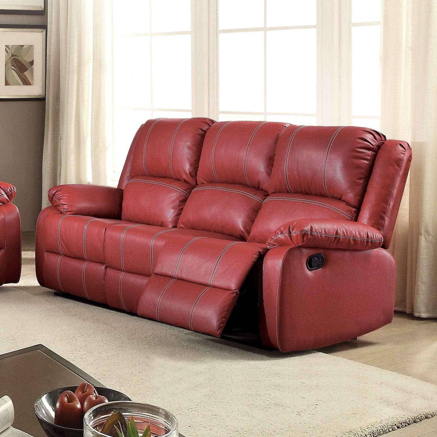 Zuriel Red Faux Leather Reclining Sofa - Ornate Home