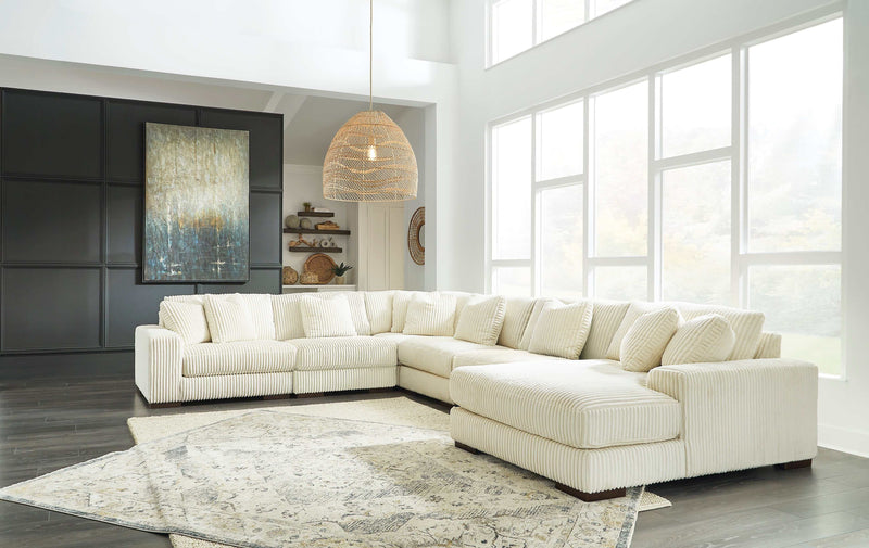Lindyn Ivory 6pc RAF Chaise Sectional - Ornate Home