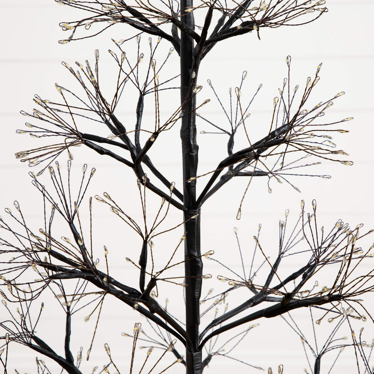4' Pre-Lit Artificial Halloween Black Starburst Tree with 800 Fairy Warm White LED Lights